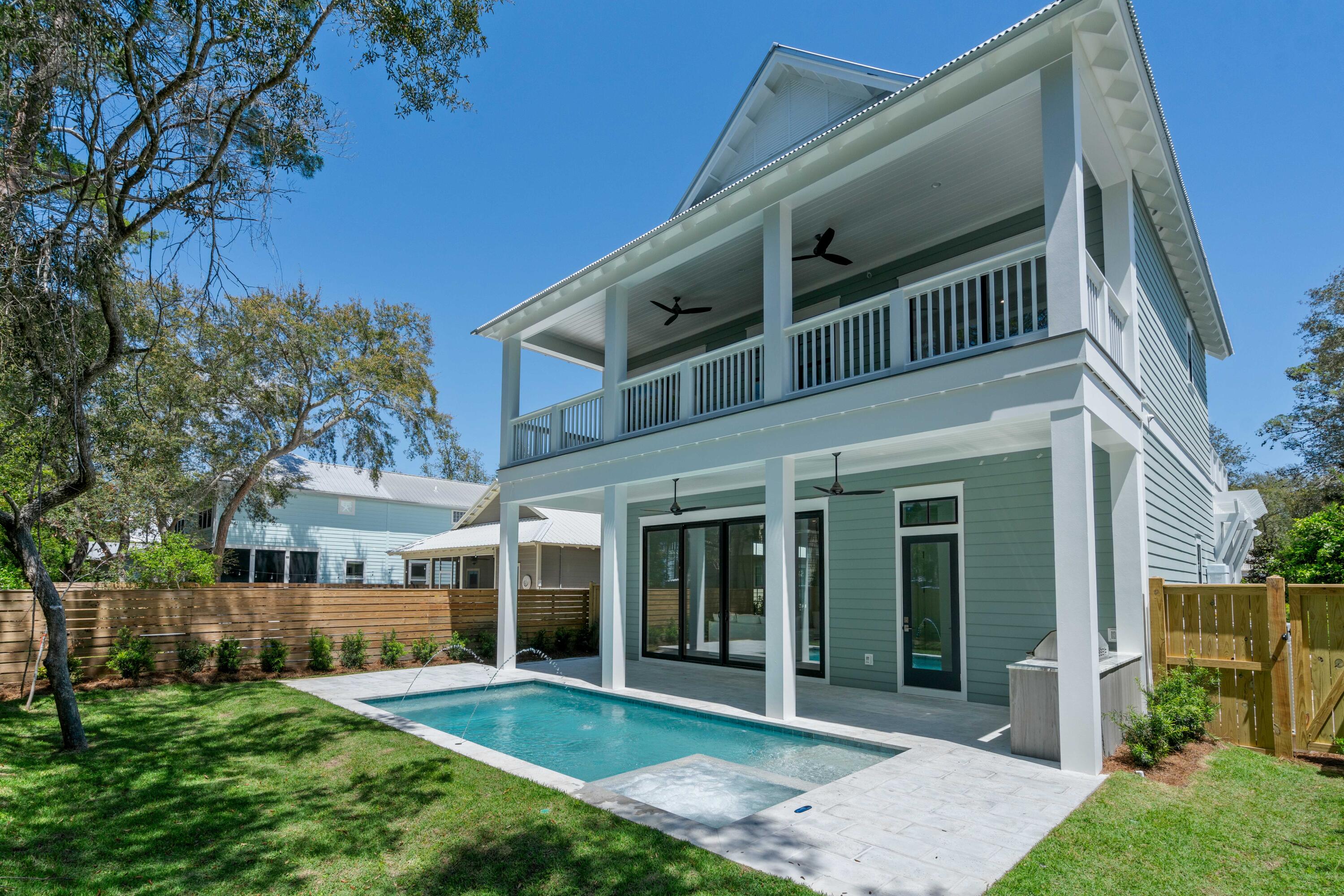 Private Pool & Spa! Deeded Beach Access! Move in Ready! $200K+ Rental Projections! Beautiful, brand new Beach home featuring 5 spacious bedrooms, all with en suite baths! Offered partially furnished as staged. Located on the desirable east end of 30a, you'll enjoy having quick access to the beautiful beaches of South Walton as well as multiple shops & restaurants in nearby Alys Beach, Rosemary Beach & 30 Avenue. Features & upgrades include an open concept layout with distressed Oak Hardwood floors, 12 ft ceilings on the 1st floor, Thermador professional appliances, Custom Cabinets, Quartz & Marble countertops, frameless glass showers, secondary living area, pool bath, vaulted & coffered ceilings in the bedrooms and 4 large porches accessible from both the common areas & multiple bedrooms!