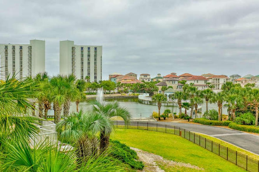 RENTAL POWERHOUSE! $50,336 in gross rental income for May'17-May'18, and an additional $33,006 in gross rental income to date for June'18- Present! Elegant in style and renovated to attract guests! It's easy to understand why vacationers love this unit! This is an end unit with a wrap deck! There are entrances from the living area and the master suite to the balcony, where you can sit and enjoy a morning cup of coffee or an evening sunset! There is also an additional balcony located off the secondary bedroom, which could be master suite #2.Bedroom 3 is equipped with twin beds, and a convenient third bath! This fully furnished 3 bedroom includes upscale furnishings and decor, TV's, kitchen supplies and two (2) polywood adirondack chairs on the main balcony. The 3/3 units do not last long