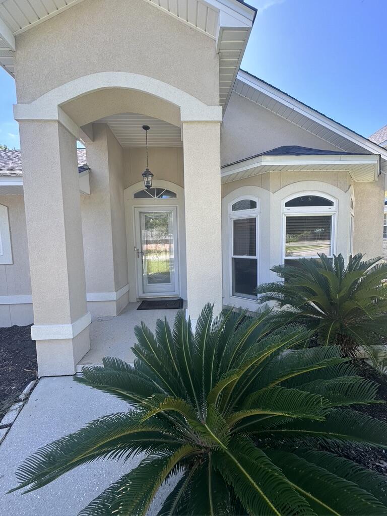Welcome to this charming 3 bedroom, 2 bathroom home located in Navarre, FL. Easy commute to Pensacola, Navarre and the surrounding areas. This home features an open floor plan with a spacious kitchen with island, perfect for entertaining guests. The master suite boasts a luxurious double vanity and a beautiful trayed ceiling. Enjoy the cozy fireplace in the living room on chilly evenings. Step outside to the large backyard, complete with a privacy fence and spacious deck for added seclusion. Take advantage of the community pool for those hot summer days or take a stroll on the beautiful nature trail. Don't miss out on the opportunity to make this house your home!