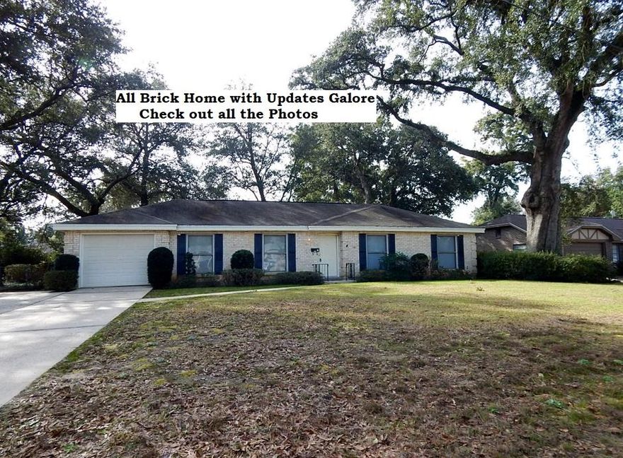 Location, Location, Location, with Updates Galore. New Copper Wiring with New Breaker Panel. The Kitchen has New Oak Sienna Shaker Cabinets with Exotic Granite Counter Tops, NEW Stainless Smooth-Top Range, NEW Stainless Over the Range Microwave, and NEW Stainless Dishwasher. The seller is also leaving the Refrigerator that is onsite. There is Laminate Flooring in the HUGE Dining room. The living room is spacious and the windows have been updated. The Bathrooms have NEW Vanities with Exotic Granite Counter-Tops. The Backyard is Fenced and Has a 11 x 11 Covered Patio with Beautiful Landscaping. The Yard has Some Stately Oak Trees & Mature Crepe Myrtles, plus an outdoor sprinkler system. Buyer to verify schools, measurements, any information that they deem important. Hydrangeas do not convey.