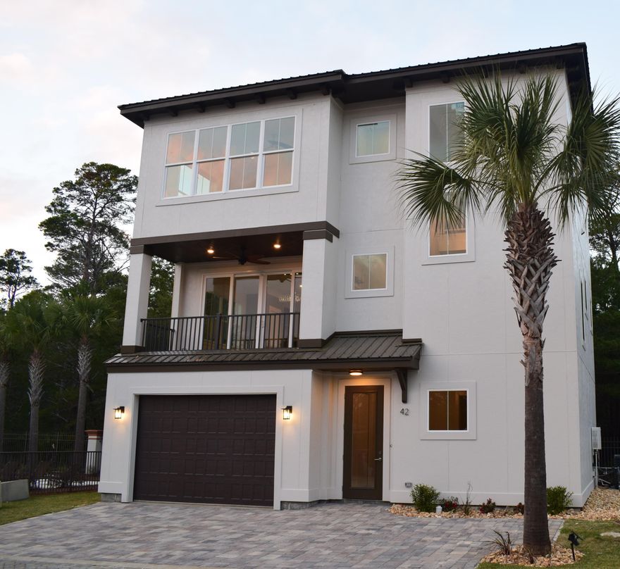 Nestled in the Mediterranean-inspired Starview Terrace, this newly completed home combines the best elements of coastal and contemporary design. Upon entry, the dramatic 30-foot foyer sets the tone throughout the rest of the well-appointed interiors. The second floor living area blends the coastal and contemporary elements in one large room. Entertain with friends and family at the large kitchen island with waterfall granite countertops and stainless steel gas range with Rinnai water heater. This 4 bedroom and 3.5 bath home features 10' ceilings flooding every room with natural light while wraparound windows create a sunbathed master bedroom with perfect sunset views. Set in the tranquil area of Blue Mountain Beach and just steps from 30A, enjoy a short bike ride to the beach at Gulfview Heights or the Ed Walline access across from Gulf Place. For those days you want to stay close enjoy the pool, outdoor kitchen and communal fire pit all within Starview Terrace.