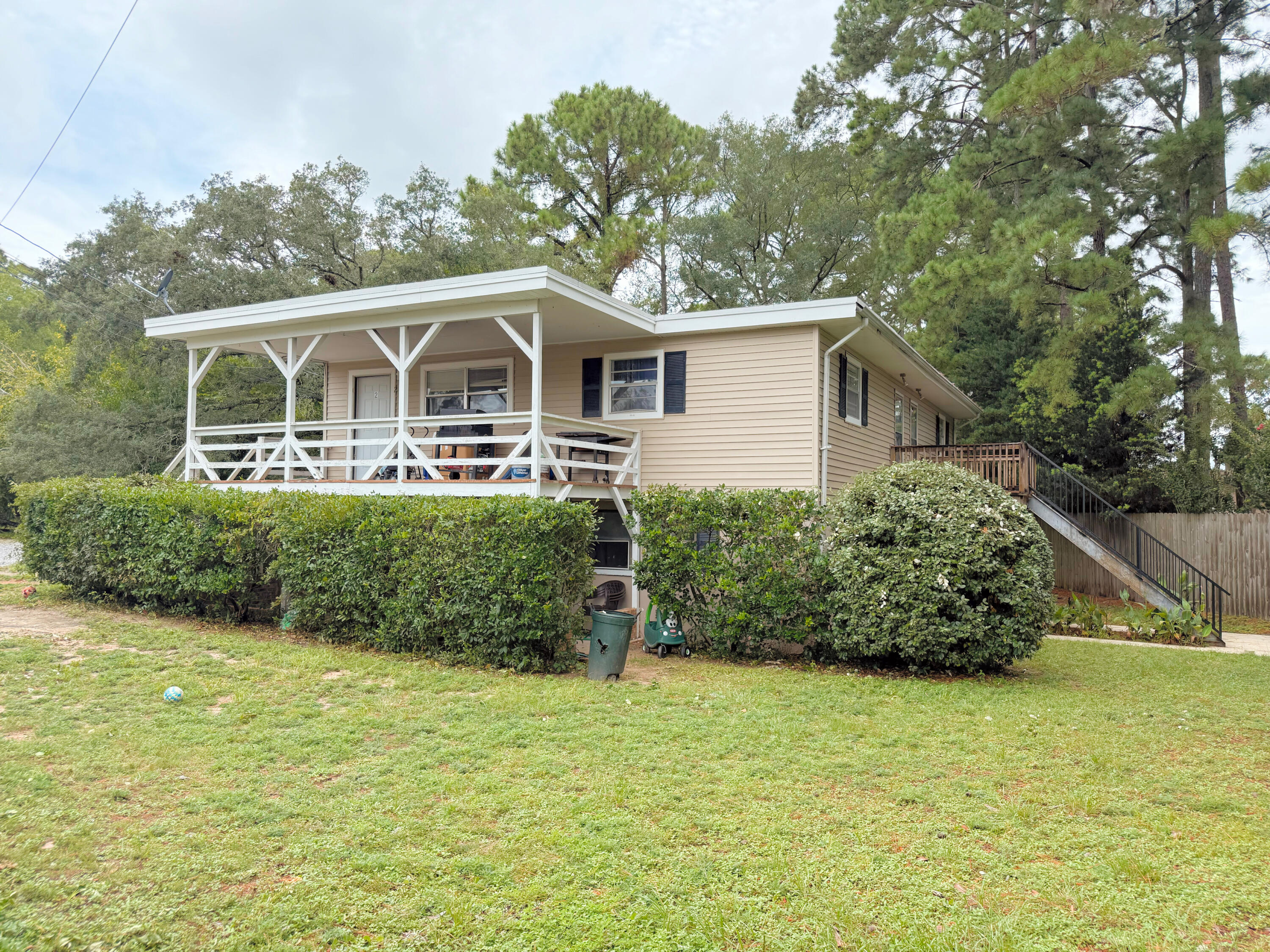 Welcome to 94 Harris Road - a fully occupied 4-plex offering 8 bedrooms, 4 full bathrooms, and approximately 2,700 square feet of rental space. Each unit features 2 bedrooms and 1 bath, making it an ideal setup for steady rental income. With a total monthly income of $5,000, this income-producing property is perfect for seasoned investors or those looking to start building their real estate portfolio. Conveniently located near schools, shopping, and military bases, this property is a solid addition to any investment strategy. Don't miss your chance to own a multi-family property in a high-demand rental area!