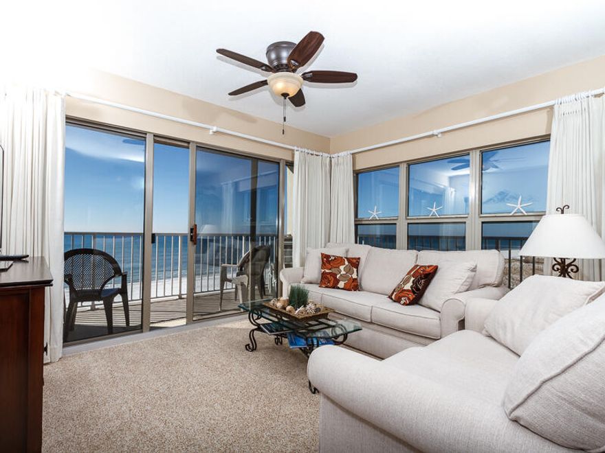 A well-appointed, 2BR/2BA, corner/end, beachfront unit with a custom floor plan! Updated kitchen with stainless steel appliances, granite counter tops - BEAUTIFUL HDTV (50') and drapes throughout!This is simply a beautiful unit with many great features. The decor is pure tropical elegance, with a classic mix of natural light and dark colors, textured fabrics, and tasteful artwork and decorative items. There are tiled floors in the kitchen, bathrooms, and entry area, while the rest of the unit has lovely sandy-colored carpeting. The best feature is the view - you can relax in the living room or on the balcony and watch the dolphins surface in the nearby gulf waters!This unit is one of only two u