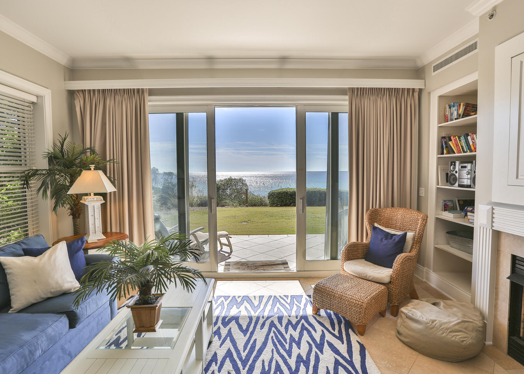 $99,898 YTD 2019 Actual Rental Income not a projection! New paint, new Hvac system, new wood-look porcelain tile in bedrooms and travertine has been stripped and polished!! This 1st floor Corner unit features 4 bedrooms, 3 baths with unobstructed gulf views of that turquoise water. Many owners have converted the large storage room to an extra bunk room, plenty of space! Please note all current rental bookings must be honored. 1st floor gives you convenient easy access to white sand beach and the sparkling resort pools plus there is a large grassy area off of patio for play and/or privacy. Travertine flooring, large kitchen with viking gas cooktop and oven, new refridgerator. Large master bedroom has walk-in closet, and access to patio