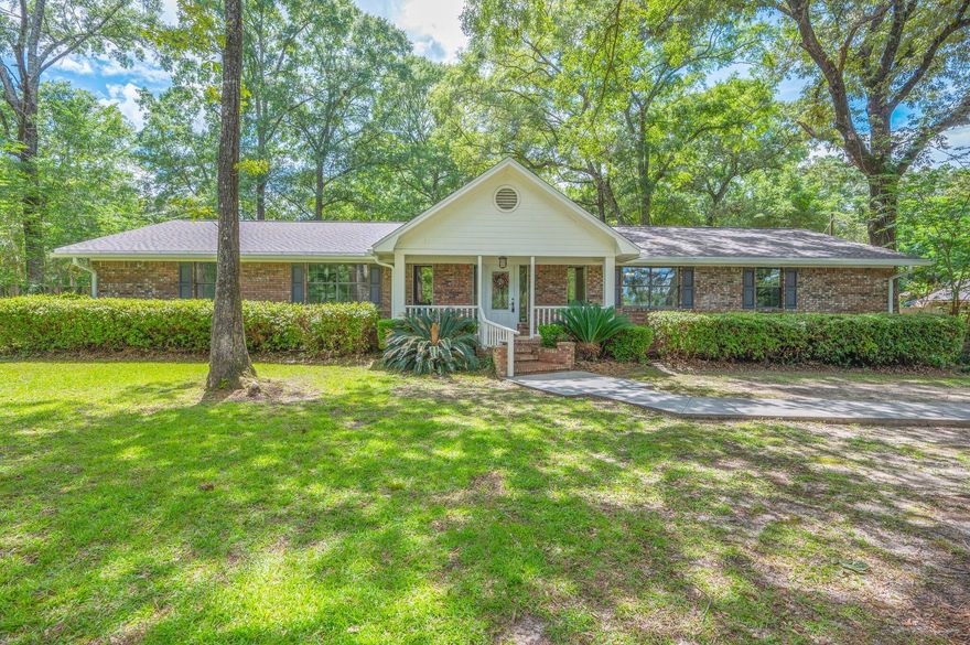 Highly desirable neighborhood. Home is on one acre. 2025 Newly painted, all new flooring, new mini split in bonus room, and BRAND NEW ROOF. 2023 Septic and drain field and HVAC. 4 bedrooms, 2.5 bath, office space with formal dining and eat in area. Living room features a large scale stone fireplace and wood beamed ceiling. Backyard has mature trees, privacy fenced and large workshop with lean to. Low county taxes, low maintenance costs with all new systems.