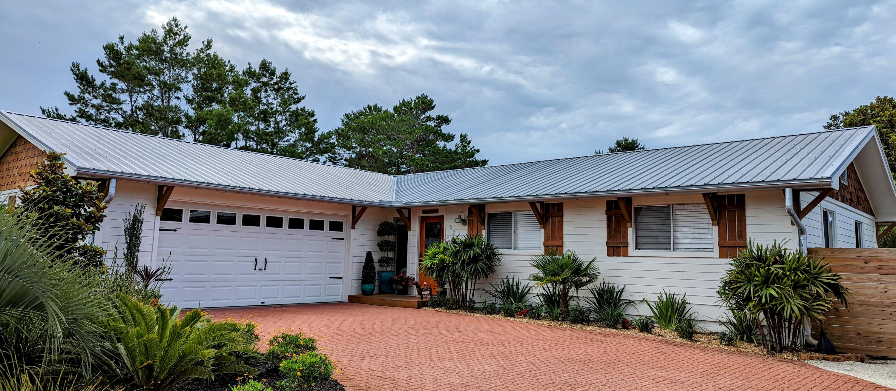PRICED BELOW RECENT APPRAISAL! Beautifully renovated beach home with in-law suite on 1/3 ACRE in the sought after neighborhood of Santa Rosa Ridge, only 1/2 mile from beach access and all that Gulf Place has to offer. If you're looking for a full-time residence or a second home, this is the one! Home boasts upgraded features such as shiplap throughout, tiled floor, quartz countertops, stainless steel appliances, 8 ft kitchen island with hood, separate laundry/pantry/mudroom, & barn doors throughout just to name a few. Enormous yard is a clean slate with endless possibilities to add a beautiful pool and outdoor kitchen or add on to the current 16x16 deck. If you're a nature lover or love gardening, you'll love the greenhouse! Side yard accomodates an RV w/hookup. No flood ins req'd!