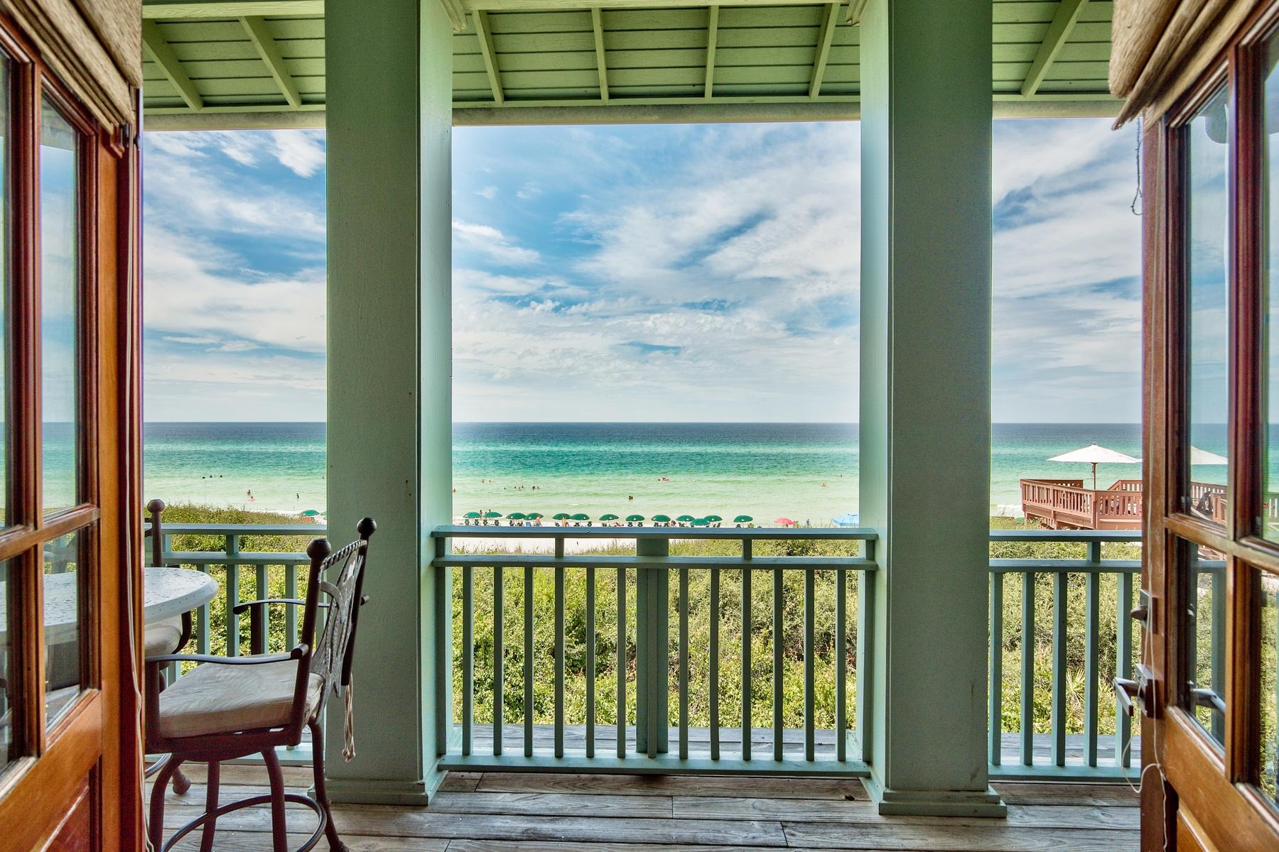 Extraordinary architectural detail juxtaposed endless gulf views characterize this prominent beachfront residence, designed by Tom Christ, ideally located near the eastern green in Rosemary Beach. This exceptional coastal cottage is situated on 34' of premium gulf frontage, tucked away just one tier east of the beach walkover as well as both privacy and serenity as well as excellent proximity to amenities such as the Rosemary Beach tennis courts & fitness center as well as one of many community pools. Thoughtfully designed, this property is comprised of both a main house and a carriage house with fortified poured concrete construction on the first level and wood frame construction on the second level.