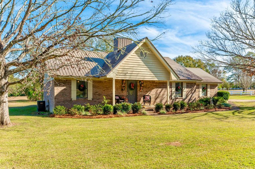 Check out this beautifully maintained 3 bd/2 ba ranch style home located in the heart of Baker. Situated on 2 acres, this property is a 'stone's throw' from Baker School (Grades K-12) and near the local grocery store. The home has an inviting front porch and inside you will find an open floor plan and a coziness and warmth about the place. The spacious living room features a wood burning fireplace with beautiful white washed surround. Functional kitchen w/ center island, gas cooking and solid surface countertops. The home has both a breakfast area and formal dining area. The screened in porch creates an extension of your living space for large gatherings and such and there is an open grilling deck off the side. A nice workshop with lean to has both power and water  and is located out