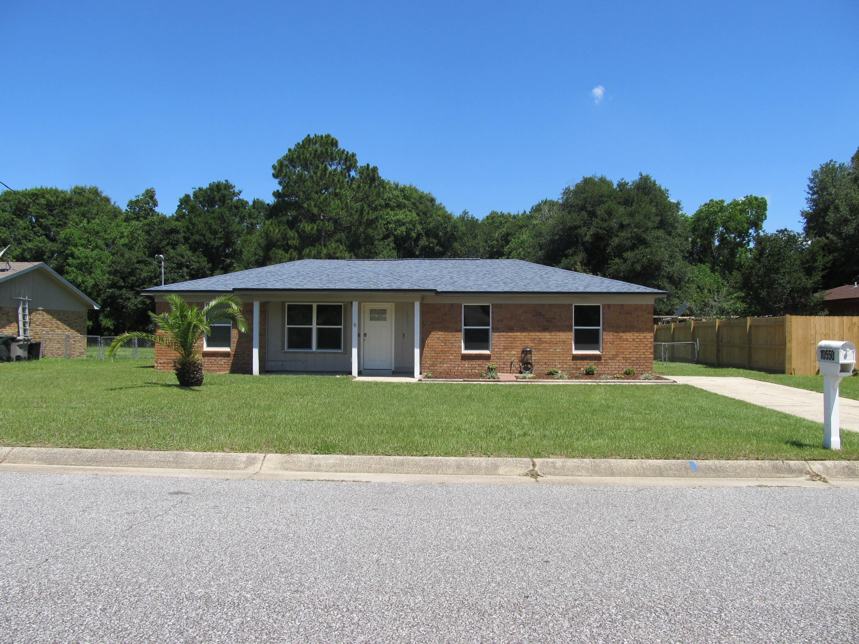 Pack your bags! You have just found an updated home on large lot. This 3/2 brick home in well established neighborhood boast new roof 10/2021. Living space features vaulted ceilings with French doors leading to dining room. Updated kitchen has new cabinets, new stove, tile backsplash and fixtures. The large laundry is big enough for freezer and additional storage and leads to expansive back yard. Master suite also features an exterior door to back yard. Bathrooms have been updated with new vanities and mirrors. Newer storm windows will be more energy efficient. Home currently has Vivent alarm system equipment that can be transferred to new owner. Don't miss out of this great home.