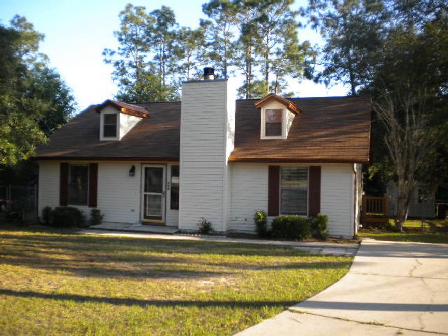 Available 05/07/2018...Cute Florida cottage in South Crestview. Easy commute to bases, beaches & shopping. Wood burning fireplace, 3 bedrooms and 2 bathrooms. Galley kitchen, dining area, and laminate flooring. Cute custom finishes in this home with large open back deck and fenced yard. Yard building with wooded privacy. No inside smoking. Pets will be allowed with a $400 non-refundable pet fee.