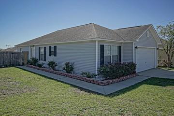 South of I-10 is this corner lot home. Open floor plan with new Luxury Vinyl Plank in the open living room and new carpeting in the bedrooms. Eat in Kitchen with breakfast bar. Privacy fenced back yard for pets or those barbeques. Two car garage perfect if you need storage or those who like to tinker around. One year home warranty being offered too. This home is perfect for the first time buyer, empty nester or investor.