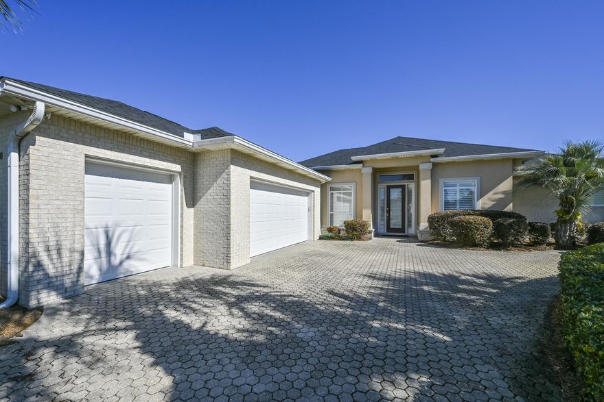 One owner Signature Builders built pristine home now offered for sale and comes with a brand new roof! 206 Avalon Boulevard is located very close to the 500+ feet of private & gated beach as well as the pool, tennis & pickleball courts. The living room is light and bright with floor to (almost) ceiling windows, gas fireplace and tiled flooring, dining area is semi open to the living area which is great for entertaining. Office/Study is in addition to a primary large ensuite bedroom with two large walk in closets, two guest bedrooms and a guest bathroom. Kitchen has beautiful cabinetry, Corian countertops, vegetable sink, island, breakfast bar, large breakfast nook and a built in desk.