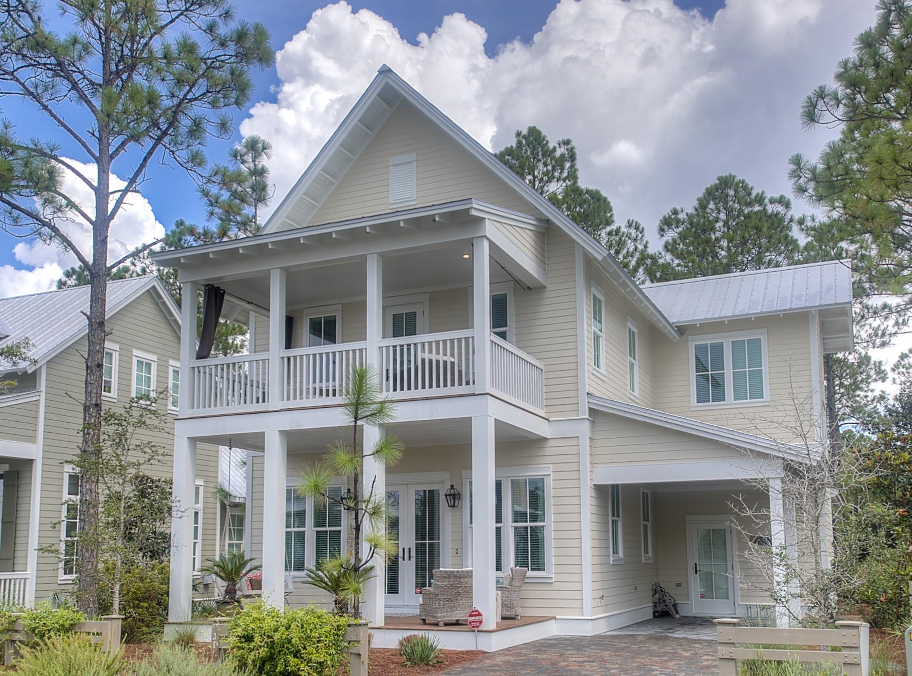 This freshly painted beach retreat is calling you! Fronting one of WaterColor's wooded preserves, this beautiful home in WaterColor was built by Romair Construction with 4 bedrooms, 4 baths, and a full laundry room. The expansive kitchen overlooks the living & dining areas, and offers top of the line built in appliances including a six burner Wolf range with vent hood, Subzero refrigerator, ice maker, wine cooler, and a farmhouse sink. Interior features include: 10' Ceilings, 8'' V Groove wood walls in common areas, Carrera Marble throughout, over 500sqft of covered porches, and an additional large screened in porch.