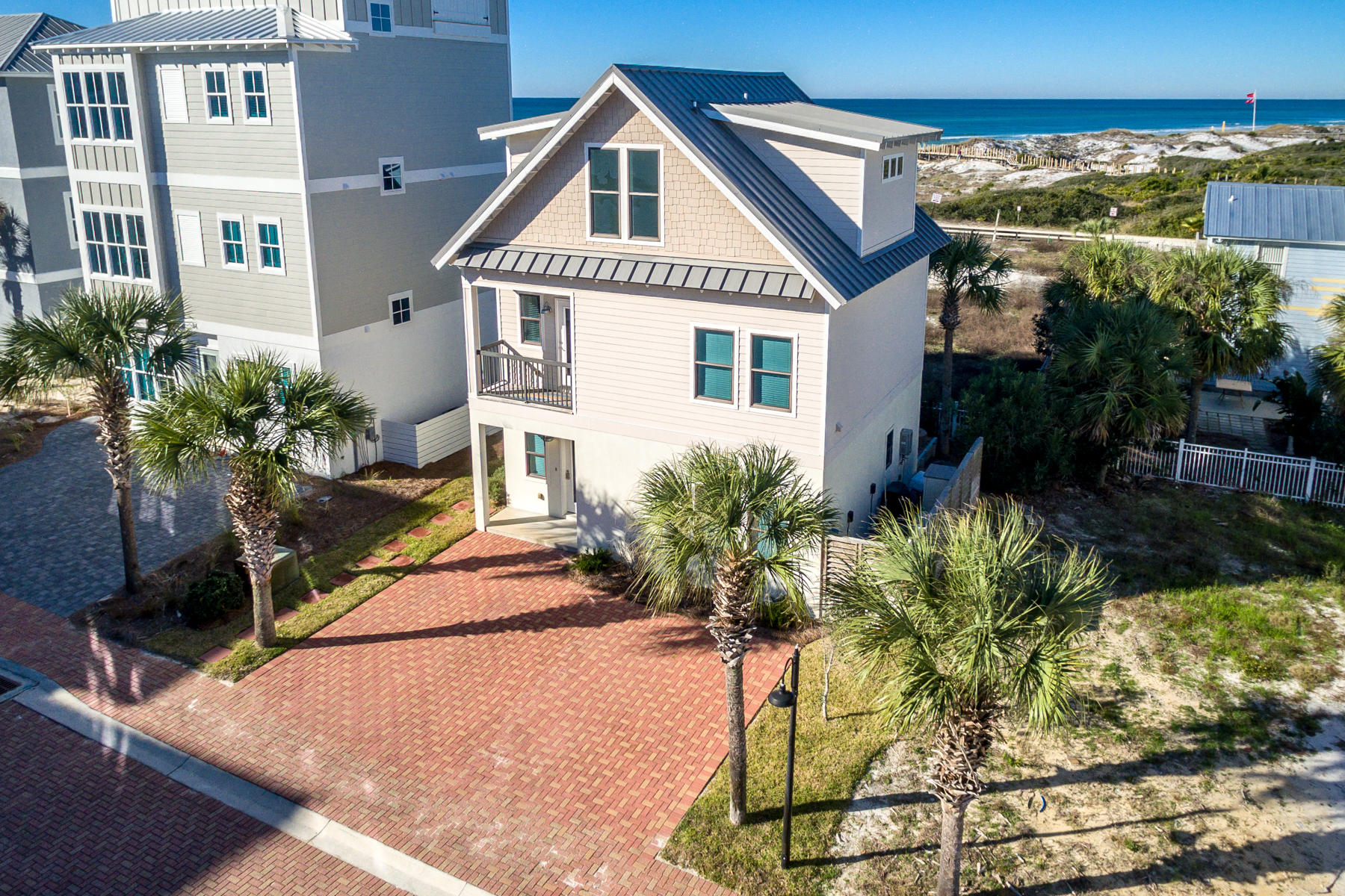 Property is under contract with a 72 hour kick out!INCREDIBLE GULF VIEWS from all floors, PRIVATE gated beach access just steps away, 189 feet of PRIVATE DEEDED BEACH and PRICED TO SELL! This custom built home located in Cottages At Inlet Beach is a beach lovers dream and is the perfect property for full time residents, investors or the perfect second home for the family. The property is ideally located allowing you to easily enjoy the world's most beautiful beaches and everything 30a has to offer. The homes first floor is the ultimate guest retreat featuring two bedrooms, 2 full baths, a living area and a kitchenette. The second floor features a large open kitchen/dining/living area as well as a half bath a pantry and laundry. The third floor is exclusive to a large master suite with