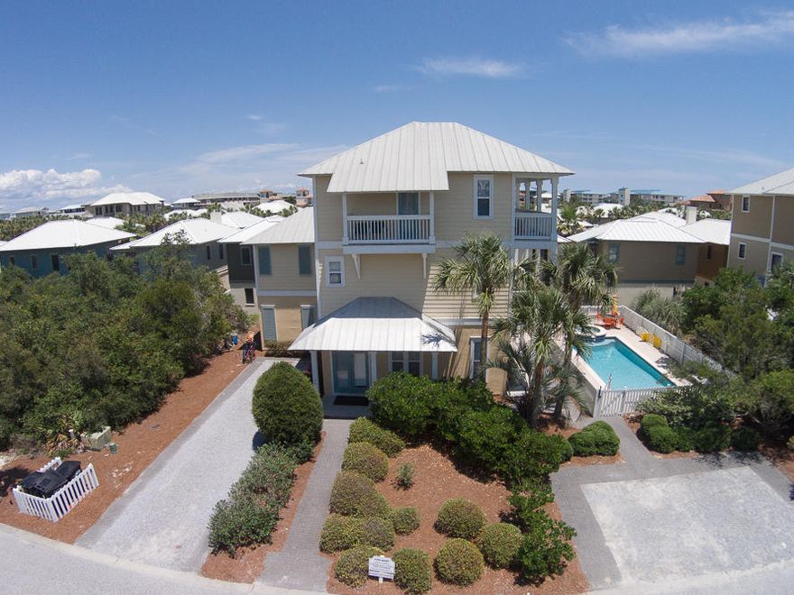 Fantastic vacation home with gulf views and a heated pool! Ideally located between Rosemary Beach and Alys Beach, in the very quiet, gated community of Sandy Shores on the south side of 30A. Just steps down the private boardwalk to the beach. Very well maintained home with fresh paint inside and out. A large open living/dining/kitchen floor plan with bedrooms on all three floors. Great outdoor living with multiple porches, balconies, grilling area and private pool. An easy walk to both Alys and Rosemary Beach to the all of the restaurants, shopping and concerts. Rental potential in excess of $100K! If you are looking for an investment property near Alys Beach or Rosemary Beach, this is it!!!