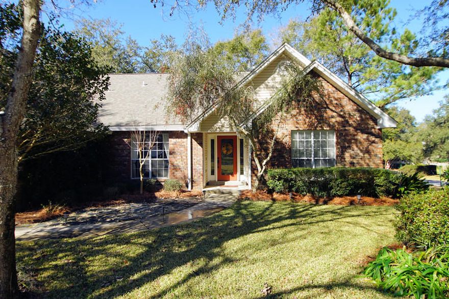 This lovely 5 bed, 3 bath home sits on a large corner in the gated community of Parkwood Estates.On entering the foyer there is a large formal dining room and a living room with fireplace and hardwood floors that overlooks the back yard.The kitchen has granite countertops, new subway tile backsplash and stainless appliances. The bedrooms on the main floor are split floor plan, with the master bedroom on one side and 2 bedrooms and a bathroom on the other.The master bedroom has hardwood floors and the master bathroom has a double vanity, garden tub and separate shower with new subway tile and frameless glass door.Upstairs there are 2 bedrooms, updated bathroom and a loft area that overlooks the great room.The backyard has a privacy fence(fence replaced in 2012)lovely stone patio and a fish