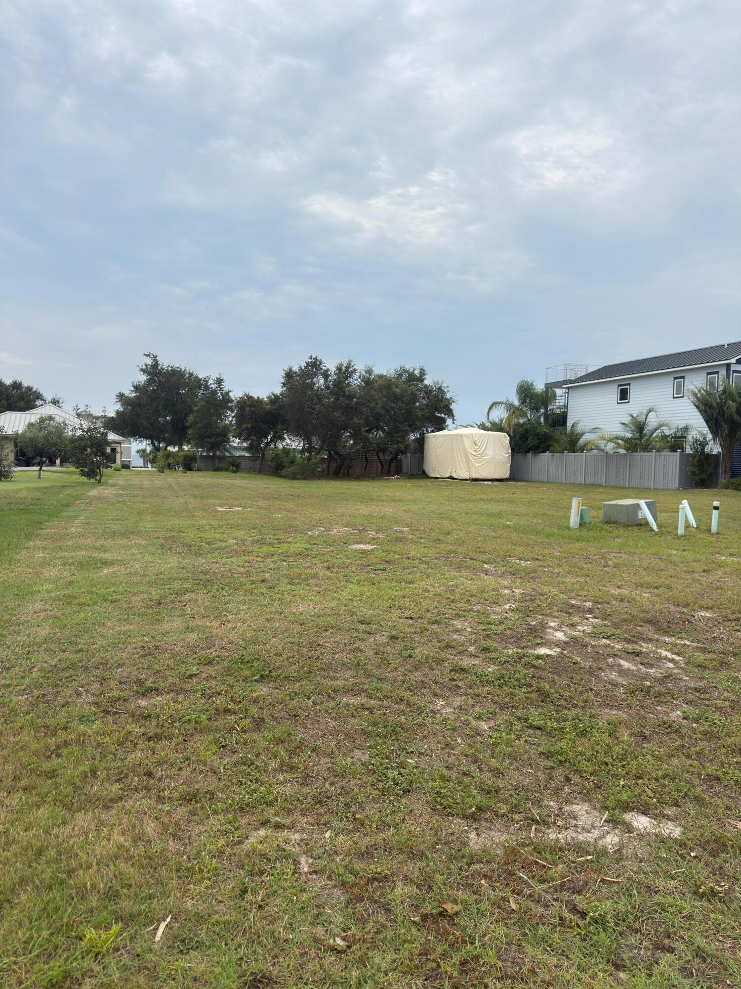 Cleared and platted building lot located on a quiet dead end street and located in an X flood zone for ground floor living options while near the beach! Less than 350' from Lightkeeper's county park that has walking trails, amphitheater, pickle ball courts, dog park, picnic facilities, boardwalk for Gulf of America access. Depending upon the height of the house plans, there may be some Gulf views available. Priced to sell. Some dimensions were obtained from the Gulf County Property Appraiser's office, please verify if important.