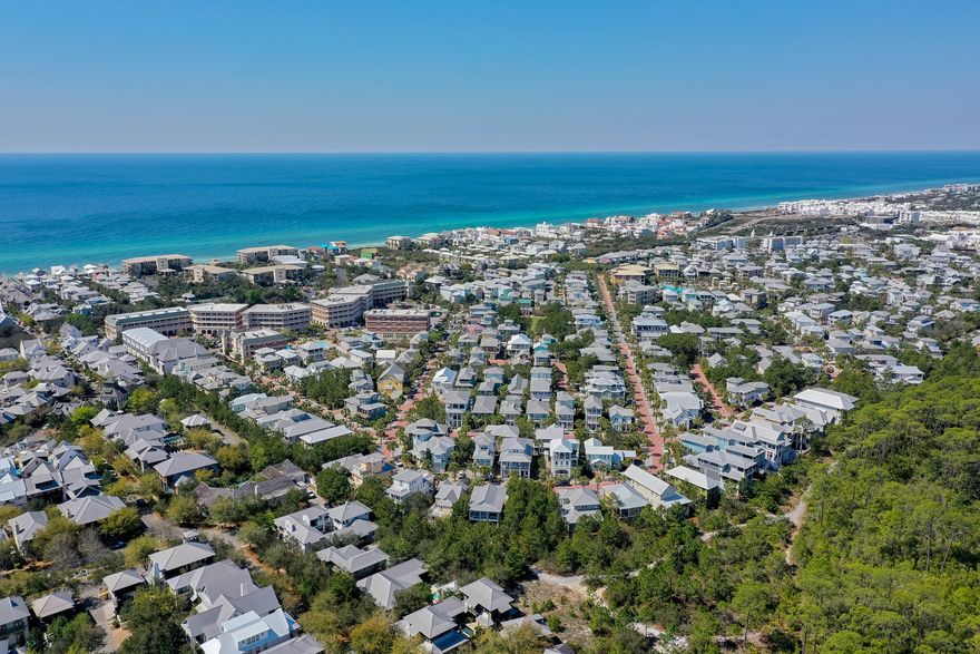 BACK ON MARKET at no fault of the property!! This Seacrest Beach lot is the perfect location for your dream beach home. Tucked away in one of the most sought-after areas within Seacrest Beach, this homesite backs up to Seacrest Beach conservation land, which offers added privacy and a serene wooded backdrop. Owners and guests in this 78-acre landmark community on Scenic 30A enjoy world-class amenities including a resort style 12,000sf lagoon pool, deeded beach access with seasonal tram service, 1.3 miles of walking trails throughout the community, and palm tree lined paver streets. Walk or bike to nearby Rosemary Beach, Alys Beach, or The Village of South Walton to enjoy dining, shopping, and seasonal events.
