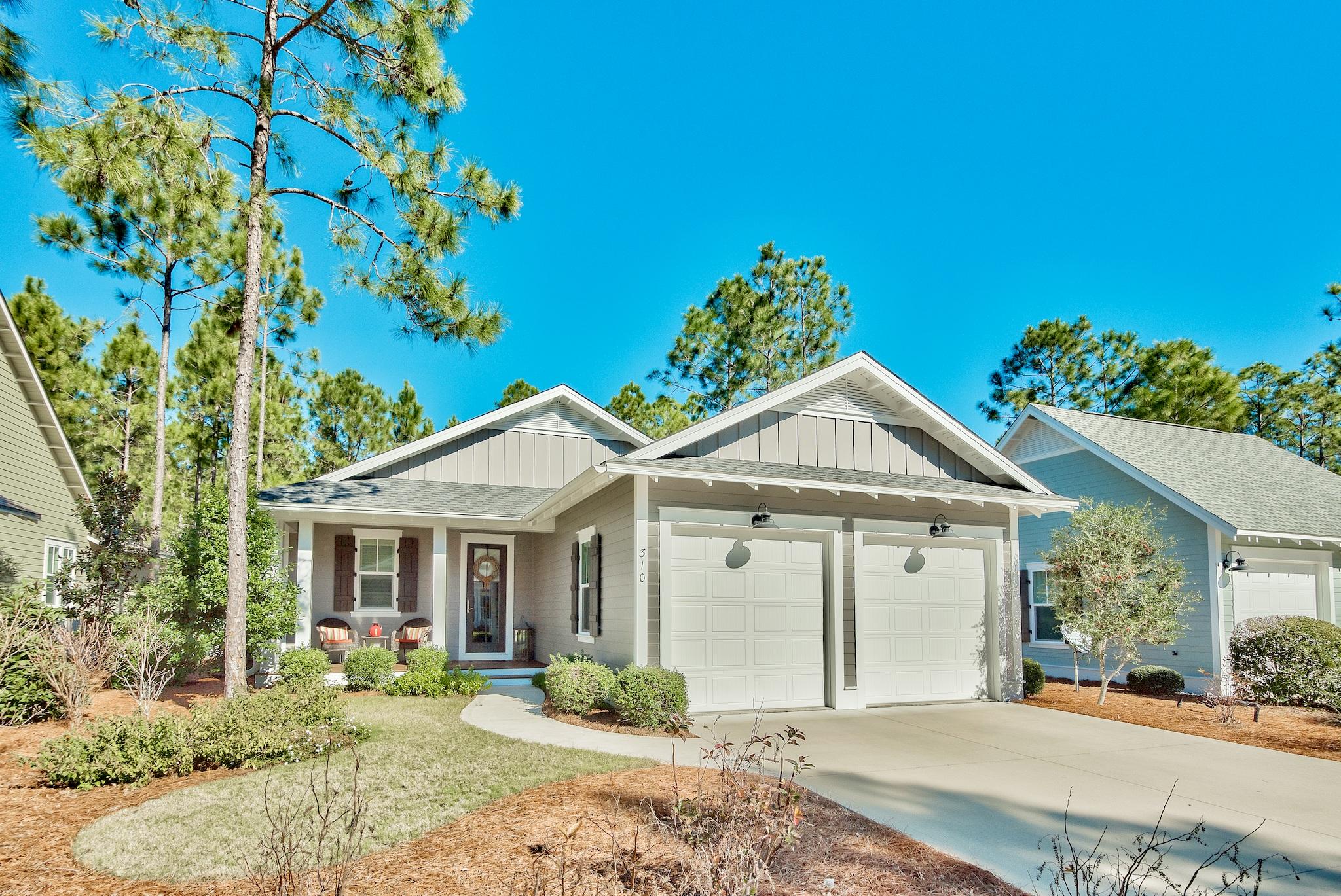 Welcome home to this impeccable and brilliantly designed home takes luxury and refined functionality to a whole new level! This popular open floor plan offers gorgeous hardwood and tile flooring plus all stone countertops throughout. The gourmet kitchen boasts a custom lighted dry bar with upper cabinets, island with sink, beautiful cabinetry, upgraded stainless appliances and flows nicely into the dining area, great room and screened porch to provide a welcoming flexible space to entertain and relax. Generous bedroom suites each with modern bathrooms and Owners retreat with spa bath and double shower heads. Sound System on Porch, Den and Dining Room. Incredible Lot with fenced back yard and Custom patio with easy access to the largest park. Easy to show and you will be glad you did!