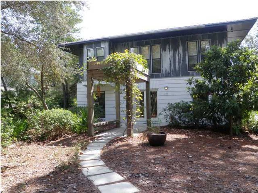 This is the best deal on a home for sale in Old Seagrove! An easy walk to the beach and Seaside, this quiet, private home packs a lot into a deceptively small package. Flexible space is the true hallmark of this home. Currently, the home is configured as an approximately 1800 sqft 3 bedroom, plus craft room (could be 4th bedroom), home on the 2nd floor, an approx. 900 sqft office on the eastern half of the 1st floor and an approx. 900 sqft apartment on the western half of the 1st floor. Given that the 1st floor spaces are connected (but can be locked off) to the 2nd floor space, the entire home could be reconfigured a number of ways. Eliminate the office space and use it as additional bedroom and living area space. Live full time in the upstairs and rent out the first floor apartment