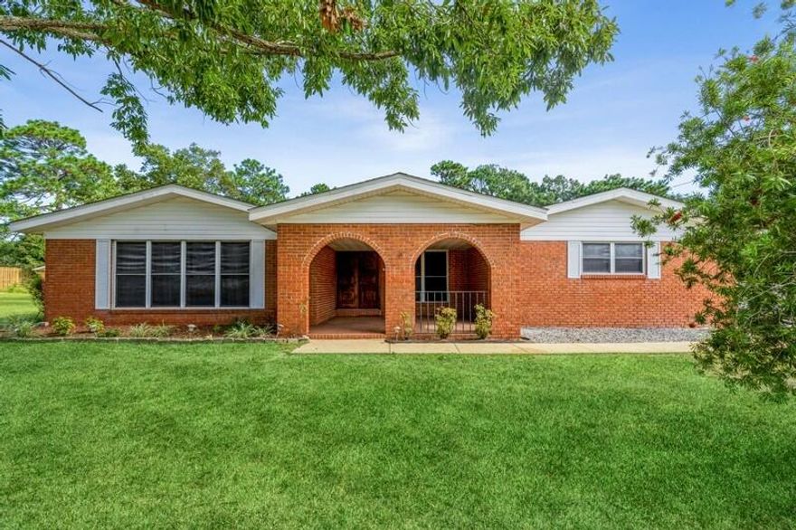 This well-built home, in a great location, is a diamond in the rough!  They don't make them like this any more!  With a few updates this home could truly be a gem! I've been told that this home was actually the first model home, for this subdivision. This is a split bedroom floorplan with a 1-car oversized garage and as you walk up to the front door, there is a massive covered front porch with brick arches, I can see you sipping sweet tea out there.  Double wooden entry doors lead into the foyer area where you will see the oversized living area (12'x21'), the large dining area (12'x16') & you'll get a peek at the man cave with sliding doors out to the back patio and yard.  Home also updated with double pane, tilt out white vinyl windows. Concrete block workshop is 15'x20'.