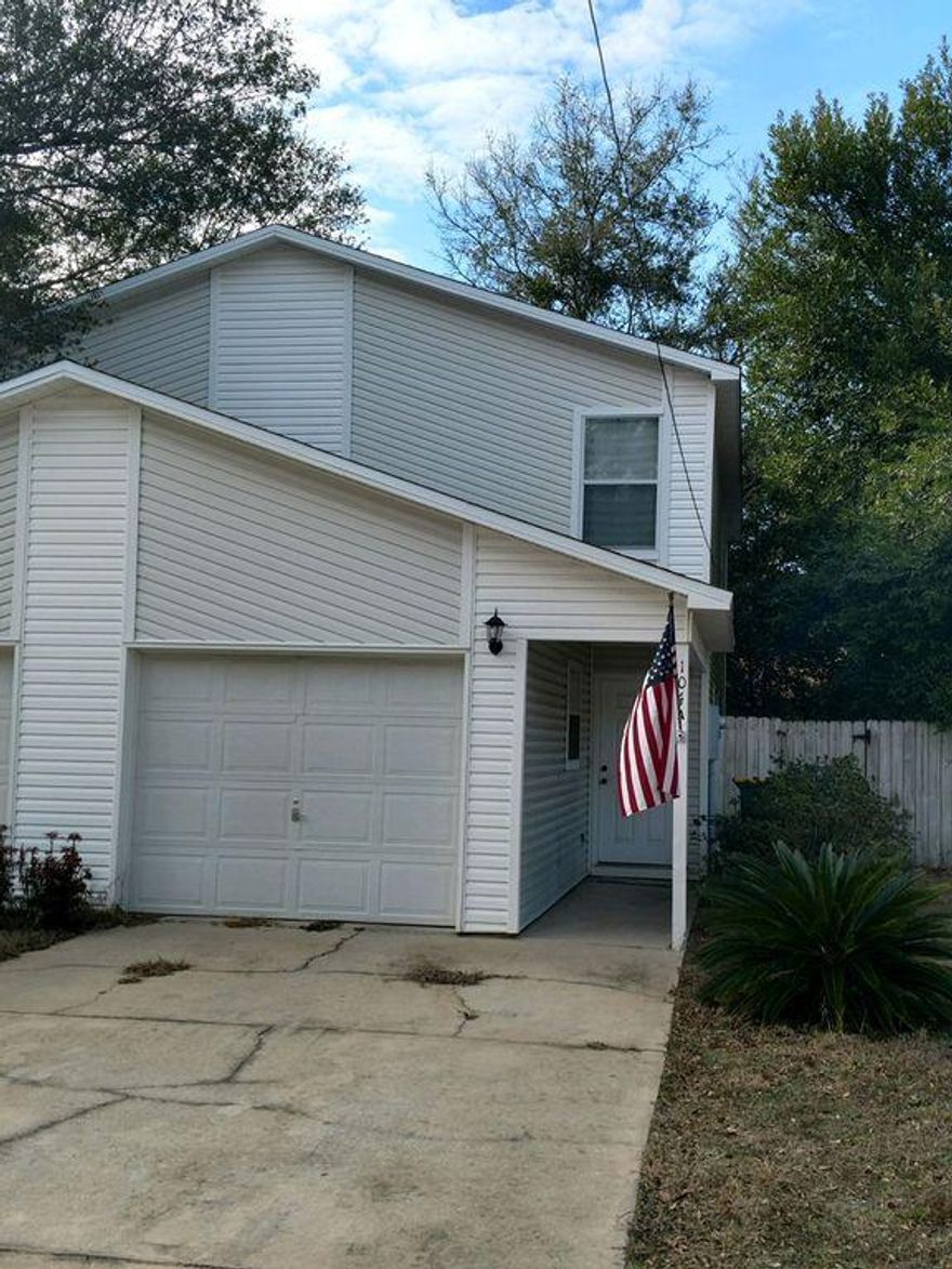 Town House was built in 1993, vinyl siding 2 bedroom 1.5 bath with one car garage. Original roof. Tile flooring in living area, kitchen and bathrooms, carpet in bedrooms.