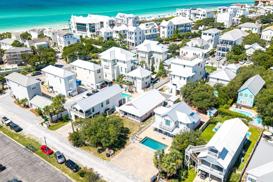 Under $1.6m with 4 bedrooms, pool and short walk to the beach! Deeded beach access of large area! $139k in rental projections.Nestled just three homes away from the scenic 30A in Seagrove Beach. Situated a mere 1/10th of a mile from the pristine white sands, this four-bedroom, three-and-a-half-bathroom home is a the ideal vacation beach home. Offered fully furnished, it's primed and ready for new owners to enjoy or use as a turn-key investment.Lovingly maintained over the past 13 years, the home boasts numerous upgrades, including a new metal roof, newly installed split unit in the upstairs area, updated bathrooms upstairs, and water heater. Also new hurricane rated windows, doors, and new cement hardie bard siding in 2020. Located just two homes north of 30A, you're mere steps from the neighborhood's exclusive beach access at the end of Pelayono more searching for beach parking.  The first floor features a primary bedroom with a full bathroom, along with a spacious, open living area. The modern kitchen is adorned with granite countertops and a tiled backsplash, accompanied by a secondary living space that's perfect for entertaining larger groups. Additionally, a half bath and laundry room open to a generous backyard, complete with a storage shed for bikes and grilling equipment.

Upstairs, you'll discover three more bedrooms and two fully updated bathrooms, comfortably accommodating up to 11 guests. The expansive pool deck at the front is an ideal spot to cool off after a day at the beach, while the covered porch offers a shaded retreat to unwind on the swing. With four parking spaces, there's plenty of room for guests.
Located in the sought-after community of Gulf Shore Manor, residents enjoy deeded beach access stretching from Pelayo to Dothan (encompassing 1,200 linear feet of beach). The home is also conveniently close to Santa Clara beach access, featuring a ramp, restrooms, and ample parking.
