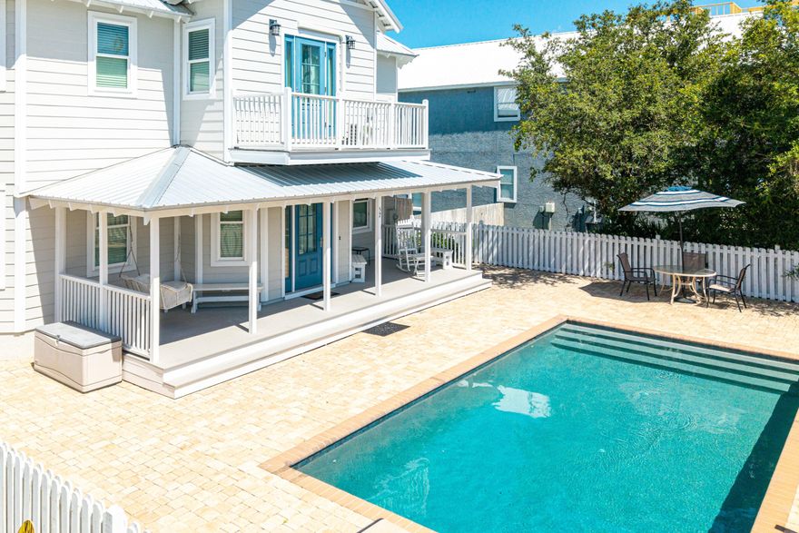 Under $1.6m with 4 bedrooms, pool and short walk to the beach! Deeded beach access of large area! $139k in rental projections.Nestled just three homes away from the scenic 30A in Seagrove Beach. Situated a mere 1/10th of a mile from the pristine white sands, this four-bedroom, three-and-a-half-bathroom home is a the ideal vacation beach home. Offered fully furnished, it's primed and ready for new owners to enjoy or use as a turn-key investment.Lovingly maintained over the past 13 years, the home boasts numerous upgrades, including a new metal roof, newly installed split unit in the upstairs area, updated bathrooms upstairs, and water heater. Also new hurricane rated windows, doors, and new cement hardie bard siding in 2020. Located just two homes north of 30A, you're mere steps from the neighborhood's exclusive beach access at the end of Pelayono more searching for beach parking.  The first floor features a primary bedroom with a full bathroom, along with a spacious, open living area. The modern kitchen is adorned with granite countertops and a tiled backsplash, accompanied by a secondary living space that's perfect for entertaining larger groups. Additionally, a half bath and laundry room open to a generous backyard, complete with a storage shed for bikes and grilling equipment.

Upstairs, you'll discover three more bedrooms and two fully updated bathrooms, comfortably accommodating up to 11 guests. The expansive pool deck at the front is an ideal spot to cool off after a day at the beach, while the covered porch offers a shaded retreat to unwind on the swing. With ample parking spaces, there's plenty of room for guests. 
Located in the sought-after community of Gulf Shore Manor, residents enjoy deeded beach access stretching from Pelayo to Dothan (encompassing 1,200 linear feet of beach). The home is also conveniently close to Santa Clara beach access, featuring a ramp, restrooms, and ample parking.

There is plenty of room in rear of house to add on, create additional outdoor living area with fireplace, etc. The options are endless on what could be created on this large area. 