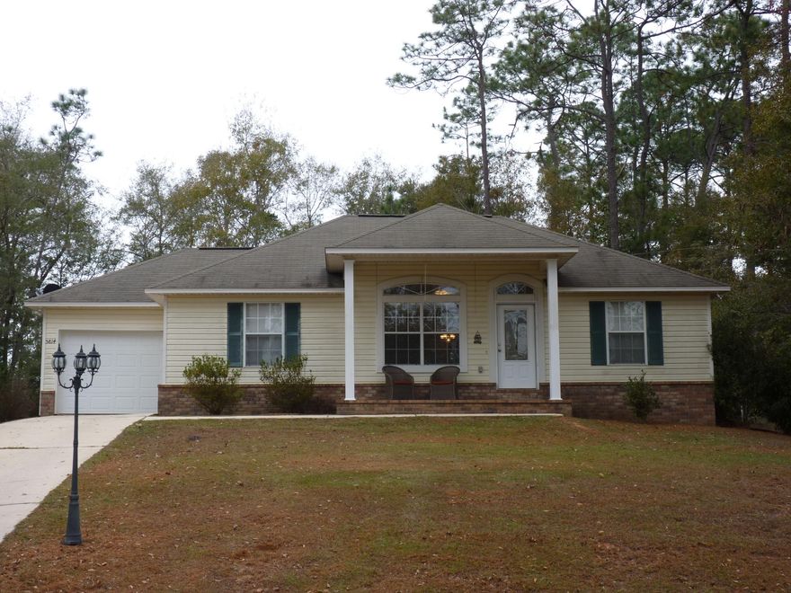 Adorable custom built home with lots of charm! Newly painted interior with neutral tones accent the architectural details. Don't let the square footage fool you. As you enter the home you will be greeted with 10 foot ceilings in the living room and an open floor plan. The large kitchen has plenty of counter space with nice black appliances and a propane cooktop. There are lots of cabinets and a pantry for storage. Relax in the large master suite with an oversized bathroom and walk in closet. Other great features are the split floor plan, lots of natural light and a large utility room. Walk out to the screened patio and enjoy what nature has to offer. All this on a 1 acre lot which has a level back yard with a storage building. Buyer to verify all dimension. Seller related to listing agent.