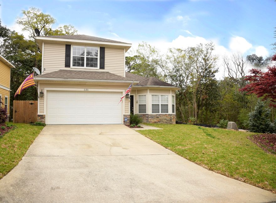 Lovely 4 bedroom 21/2 bath home nestled at the end of Maple Street.The master bedroom suite is on the first floor and the additional bedrooms and a full bath are on the second. A half bath is just off the living area on the ground floor. The spacious first floor offers a roomy kitchen, dining area and  living area that invites gatherings of friends and family. The lovely tile flooring on the first floor transitions to bamboo hardwood at the staircase and throughout the second floor. There is a deck off the kitchen that provides access to the fully fenced and secluded backyard with its paver patio and firepit. Warm and inviting, this home will provide the new owner with a lovely place to come home to! There are woods in the back which which provide privacy giving this home a secluded feel.