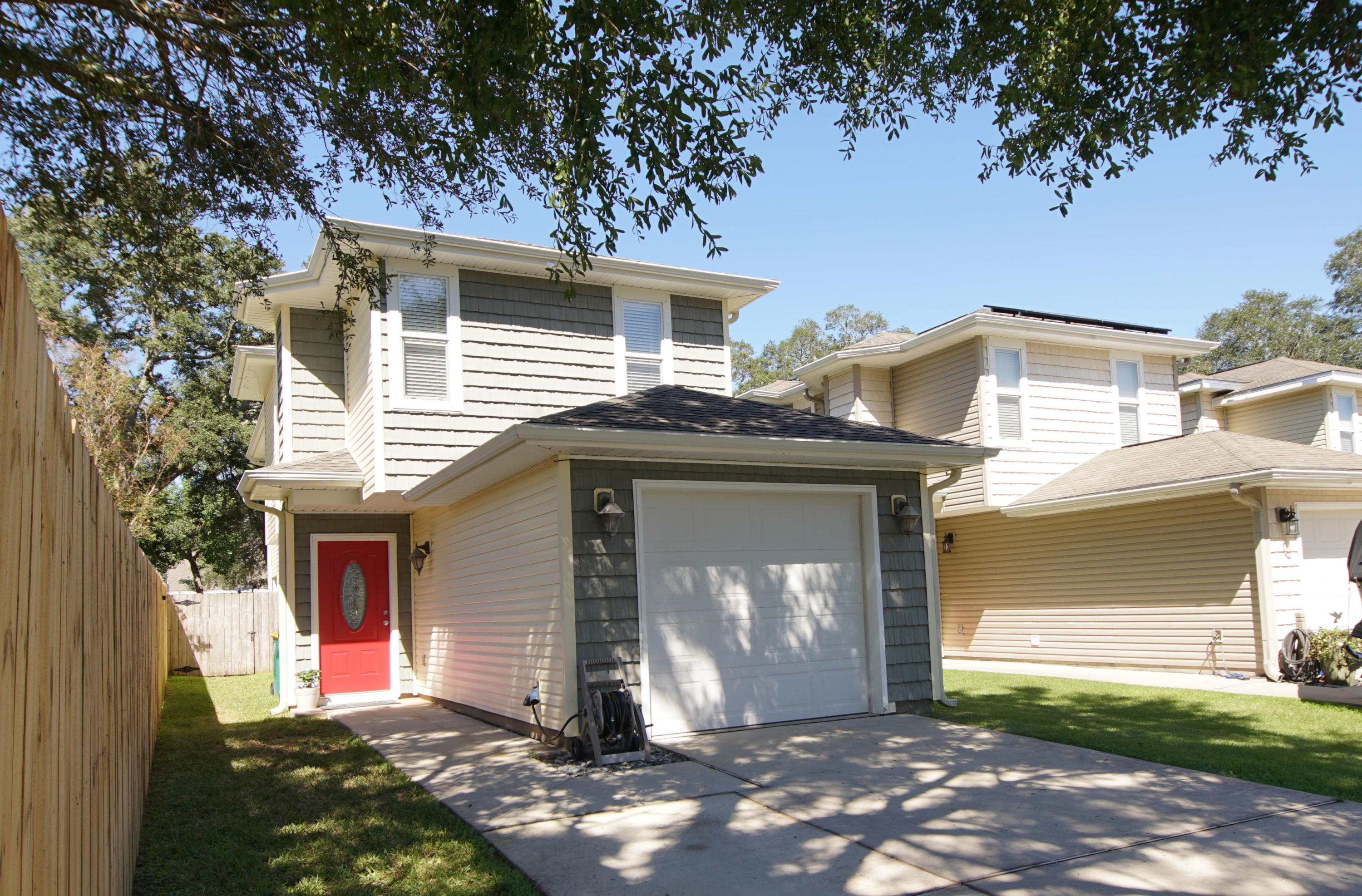 Remodeled home built in year 2008 with 1372 sq ft, 2 master bedrooms and 2.5 baths! This home is conveniently located close to military bases, Eglin and Hurlburt, and only 10 minutes to the white sandy beaches of Fort Walton Beach FL! There is a new roof with 10 year warranty! This gorgeous home has been remodeled. The updated kitchen includes stainless steel appliances, custom cabinetry with crown, granite counter tops, a new undermount sink and faucet, new garbage disposal and new cabinet hardware. The appliances include a side by side refrigerator, built in microwave, dishwasher, and stove/oven. The flooring on the first floor has been upgraded to Luxury Vinyl Plank!