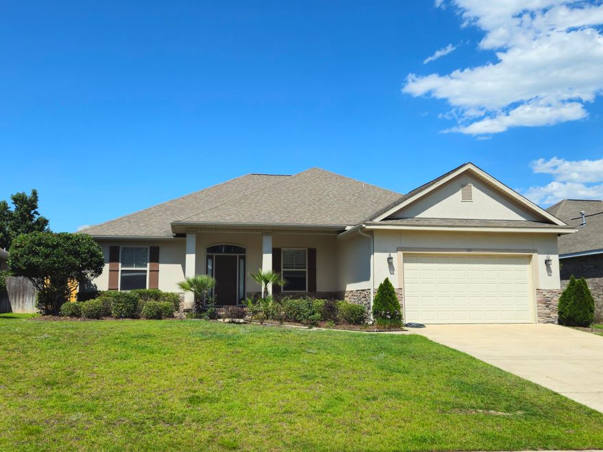 Step into this beautiful 4-bedroom, 3-bath home, nestled among majestic pines in Crestview's Shadow Pines neighborhood. Located just off PJ Adams, enjoy quick access to schools, shopping, and a short commute to Eglin AFB and Duke Field.Inside, 9-foot ceilings soar to 10 feet in the living room and master suite, creating an airy feel. The chef's kitchen boasts granite countertops, custom cabinets, a pantry, and a cozy breakfast nook.Step through French doors to the under-roof lanai, perfect for relaxing or grilling in the expansive backyard, featuring an irrigation system.The Jack-and-Jill bath layout, spacious bedrooms, and single-level design make this home ideal. Freshly painted, with new vinyl flooring in the bedrooms and an epoxy-coated garage floor, it's move-in ready.
