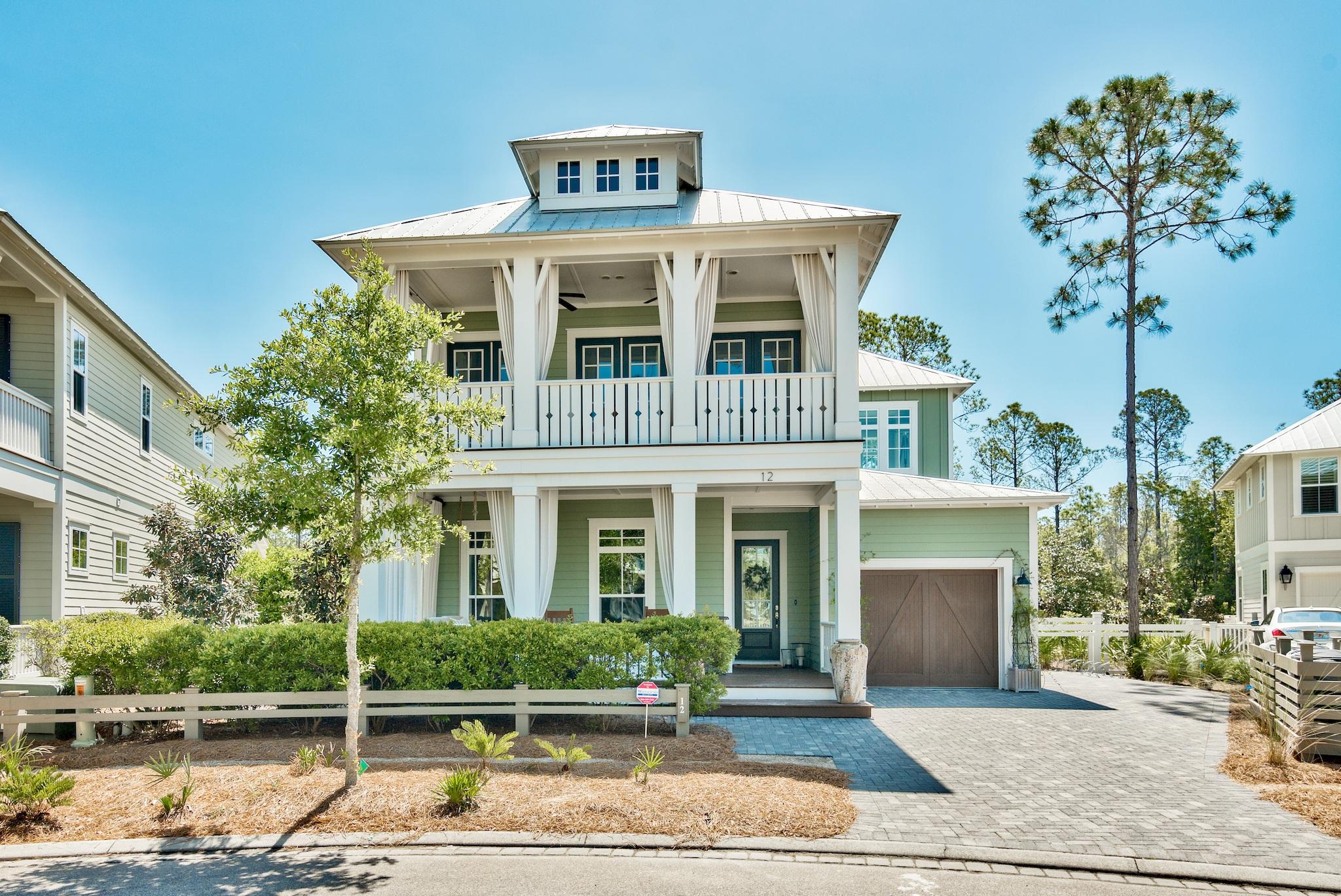 Spend your days relaxing in the much sought after Planned Community of WaterColor Phase 4 in Santa Rosa Beach, Florida. The custom built home, by Weekley Homes, boasts 3239 sq ft with 4BR/4.5BA, large Master Suite, a bunk room, a sitting area on the second floor, a study on the main floor and a one car garage. The home has elegant hardwood floors throughout, with beautiful crown molding in each room. The main level features an open living/dining area, ideal for entertaining and a gourmet kitchen with custom-made cabinetry, modern hardware, and stainless steel appliances.The spacious master bedroom, located on the home's second level, can become the homeowner's private retreat, complete with french doors that open to reveal a large private balcony, with privacy curtains and quaint...