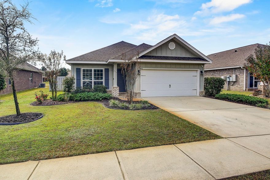 Welcome to your new lakefront home in Passages at Hammock Bay!  364 Whitman Way has all the features you desire and includes beautiful sunsets from your covered patio!  Upon entering, this 3/2 brick and hardie plank home offers a large flex room full of natural light and double French doors.  Situated just off the foyer, this is the perfect office, play room or formal dining room.  Your kitchen is bright and light with plenty of cabinets, granite countertops, spacious pantry and island. The open plan flows seamlessly into the dining and living areas, providing the perfect area for entertaining and enjoying Florida waterfront living. Vaulted ceilings are found in the living room which opens onto a covered patio overlooking your lush yard and serene view.  Fully fenced, your large lot has a
