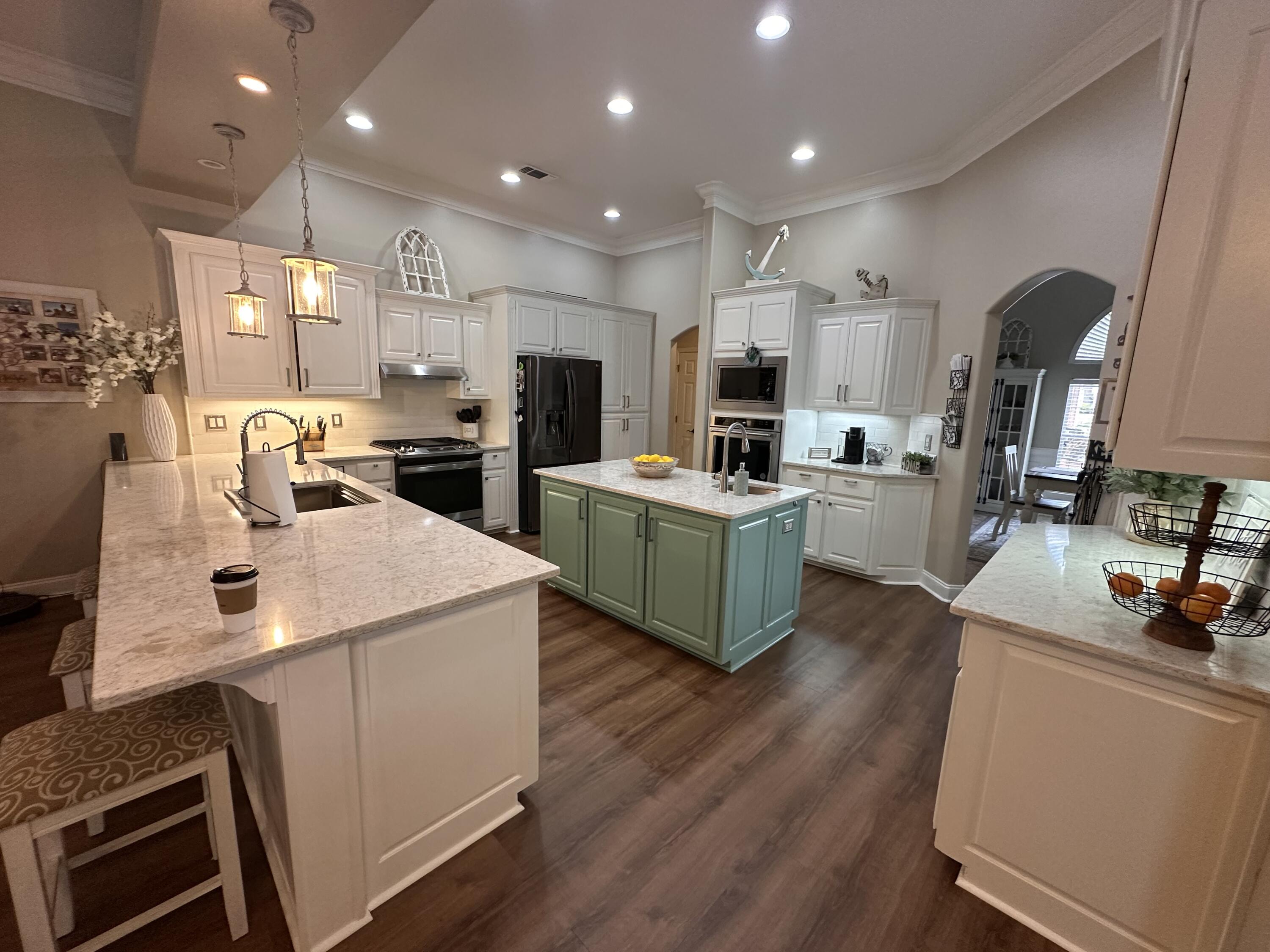 Welcome to this stunning 4-bedroom, 3-bathroom home located in the highly sought-after Rocky Bayou Estates neighborhood in Niceville. Thoughtfully remodeled with modern finishes and timeless charm, this home offers spacious living, elegant upgrades, and a sparkling pool perfect for entertaining or relaxing in your private backyard oasis.