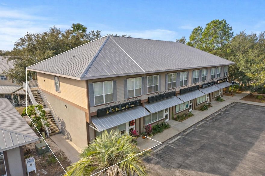 Rare and sought after live/work opportunity in the heart of Destin. Enjoy a first level commercial end-unit currently configured as office space coupled with a one-bedroom residential unit above featuring a full kitchen, living area, and dedicated access separate from the commercial unit.  Located just north of Highway 98 on Airport Road, the location is strategically positioned within close proximity to Destin Executive Airport along with ample retail, dining, and commerce venues. The first-floor commercial unit is generously sized encompassing an open flex area, private office,  kitchenette, and bathroom creating a blank canvas for a multitude of uses including professional services, a legal office, real estate office, and much more. 986 Airport Road is a truly compelling configuration for owner-operators and investors alike- inquire today to learn more.