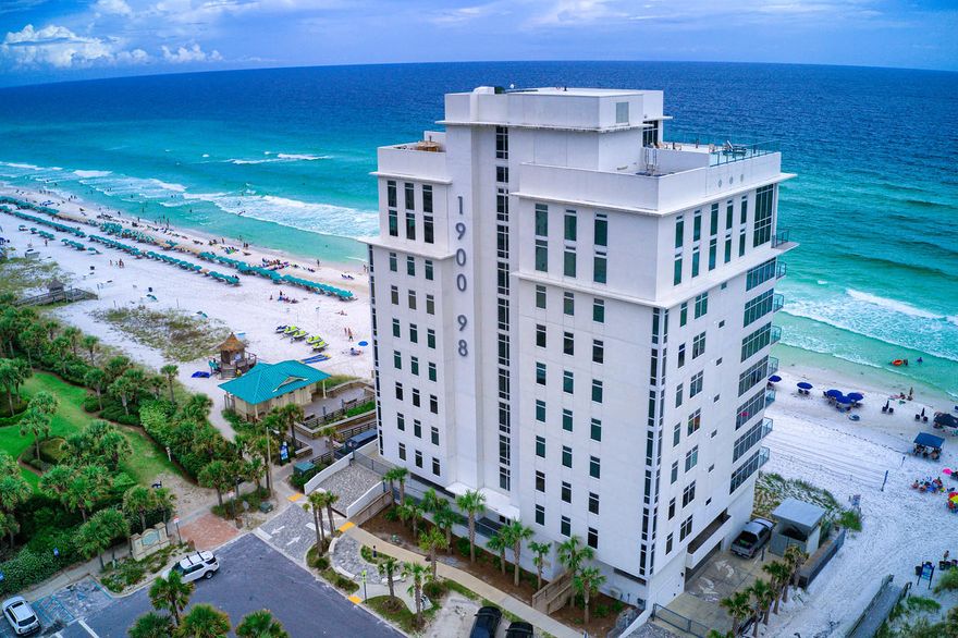 1900 Ninety Eight is Destin's newest luxury high-rise. Experience panoramic views of the Gulf of Mexico from this contemporary condo comprised of only 16 private residences.  Unit 402 faces the West with coastline views extending for miles. The spacious and open floorplan allows for an abundance of natural light through the expansive wall of windows; all controlled by Lutron Electronics.  Enjoy cooking on the Thermador kitchen appliances or the outdoor grill all while looking at the beautiful gulf waters. This particular unit also features an extra office space or creative nook.  Amenities include a rooftop pool, spa, fire pit and state of the art fitness center, along with gated entry, heated & cooled elevator/lobby area and two levels of parking beneath the residences.