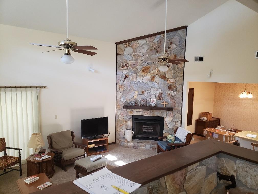 A most delightful Townhouse. 2 car garage, One year old metal roof, carpet looks like it was just installed, Huge Great Room with a beautiful fire place, large yard with magnificent oak trees, split bedroom design, Large master bedroom opens on to a private covered deck located in the middle town with easy access to Eglin, Hurlburt and the Beaches