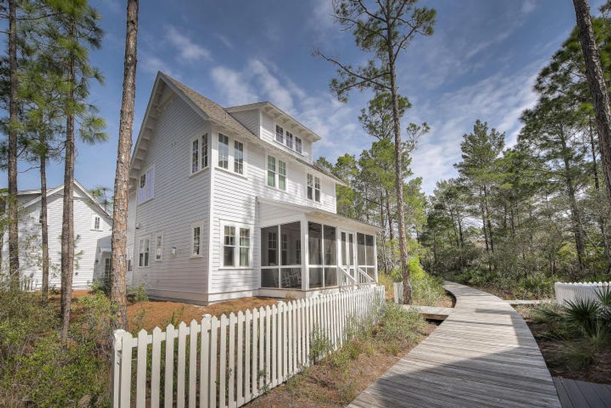 Great price for this gorgeous home in the coastal retreat of WaterSound West Beach! Beautifully appointed with designer furniture the home is offered turn-key. A spacious open concept floor plan is perfect for entertaining. Gourmet kitchen with professional appliances, white washed hardwood floors, marble countertops, multiple master suites, abundant windows, large screen porch & a full guest carriage house above the 2 car garage are a few of the features that set this home apart. The gated community of Watersound West Beach offers private deeded beach access, a beautiful zero entry community pool with clubhouse, outdoor grill & fireplace, miles of boardwalks & access to the WaterSound Beach Fitness center. WaterSound West Beach is south of 30A and is bordered by Deer Lake State Park