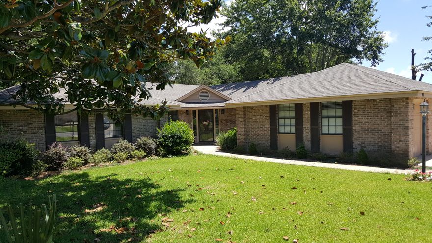 Picture perfect family home in the heart of Destin only a short distance from schools, shopping, and dining! This 4 bed/2 bath home is beaming with natural light, high ceilings, built in cabinets and hardwood floors in the living room and dining room, lots of closet space, Florida room with over-sized skylights and Mexican tile, a substantial back yard with gates on both sides and much more!!! This home is a must see!