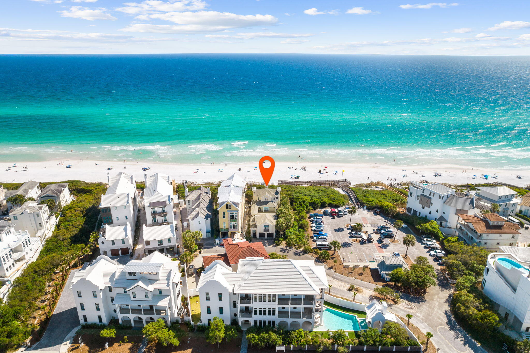 Excellent Gulf front opportunity in Seagrove Beach! This custom built home standing 29.5' above sea level would be spectacular when remodeled or an incredible homesite for your brand new Gulf front beach home. Should you choose to renovate the residence, enjoy a private dune walkover, private oasis pool & courtyard & a carriage house for guests. Magnificent views from the high dune bluff, overlooking emerald waters & white sand. The interior of the house has upscale finishes & appliances, such as Australian cypress floors & reclaimed knotty pine flooring, Sub Zero refrigerator, Wolf steamer, microwave & stove, separate ice maker & two gas log fireplaces. With a spacious guest house overlooking the pool and fabulous balconies to watch stunning sunset this home makes entertaining a dream!