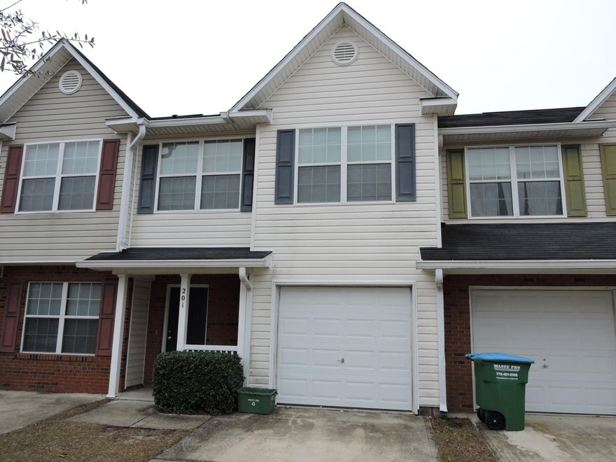 Available 12/23 -will show on weekends. Freshly painted throughout! Great location South of Hwy 90 -- Townhouse in Rolling Pines subdivision. If you are looking for low maintenance, this place is for you - lawn maintenance is included in rent. The kitchen with breakfast bar is open to the living room and overlooks the back patio. Includes a 1 car garage. This unit has a LARGE backyard & overlooks the ''Nature area'' for additional privacy & enjoyment. Upstairs you will find 2 nice sized guest rooms, full guest bath, large master bedroom suite with walk-in closet and master bath (1/2 bath Powder room downstairs too!). The washer & dryer is included upstairs for ease & convenience, no more taking your laundry up & down! Centrally located near Lowes, Walmart, Hospital