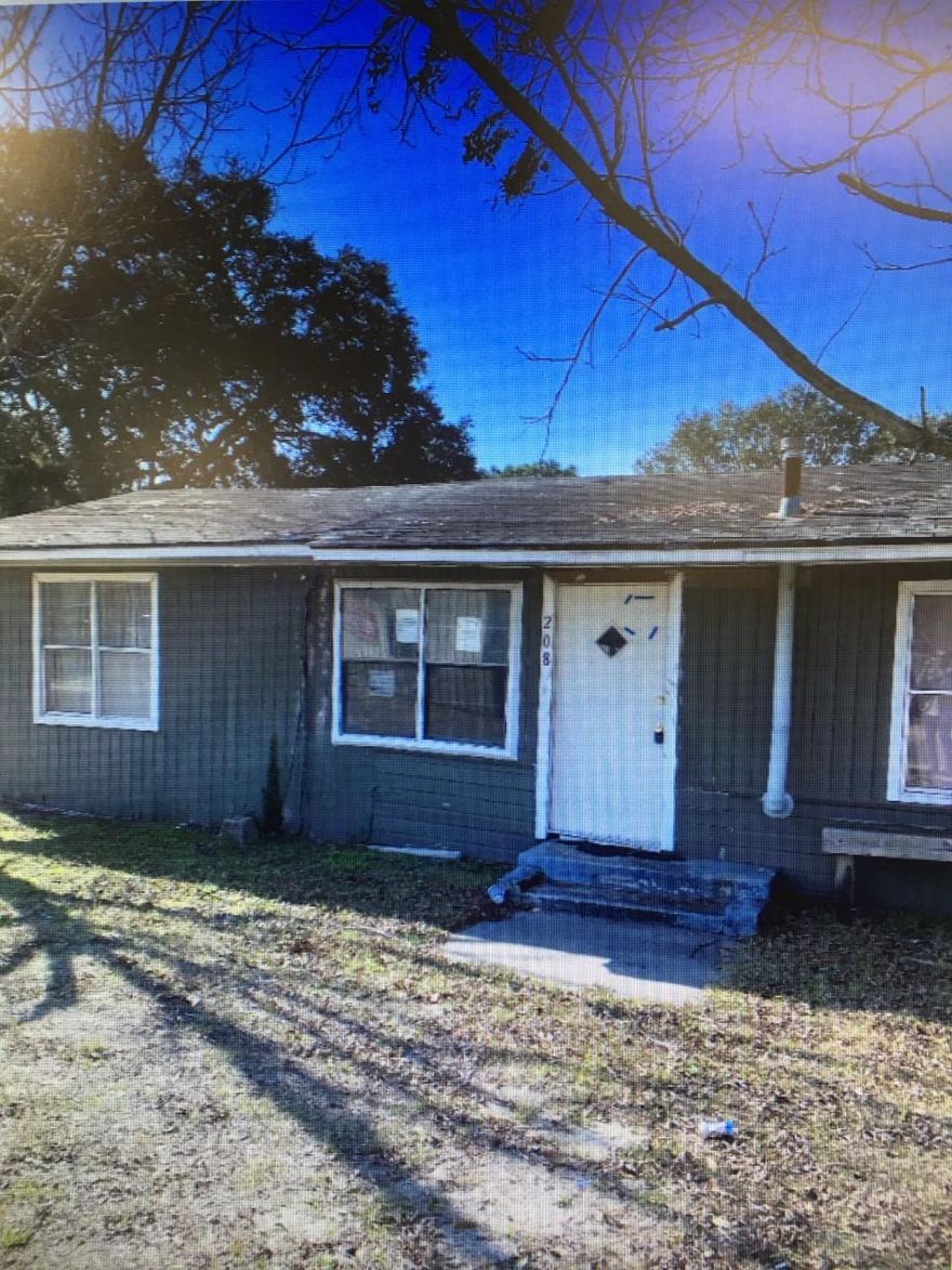 Calling all investors!  AS IS Sale.  No Seller Disclosure - seller has no knowledge.  Utilities are off; buyer will need to turn on if inspections are needed.  There is an easement  on the edge of the property to the trailer that sits behind the property.  Buyer to verify all measurements and pertinent information.