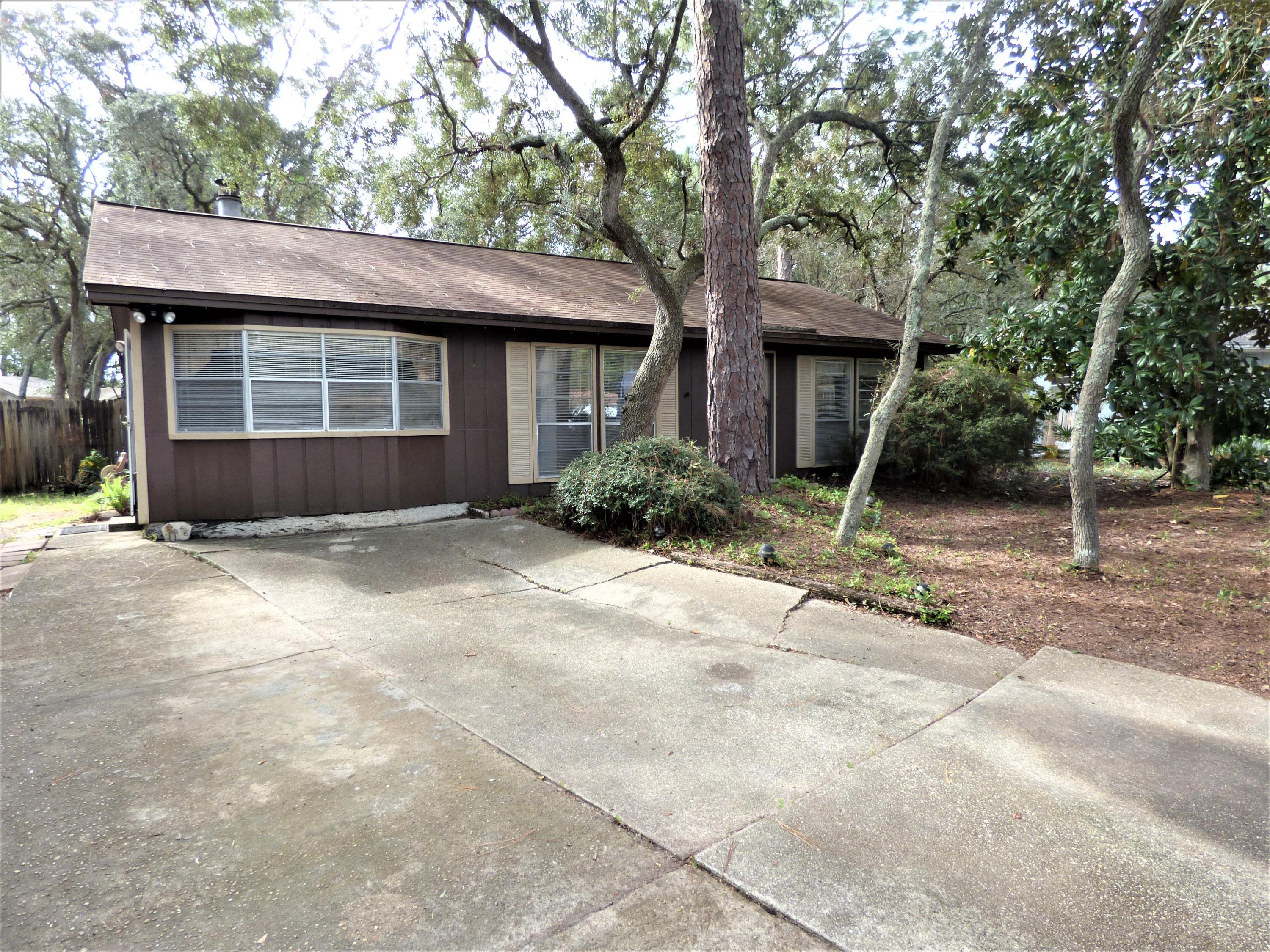 Being sold AS-IS....CASH or RENOVATION LOAN REQUIRED as home will not qualify for traditional financing. GREAT LOCATION in an established neighborhood, Easy accessibility to Eglin AFB, Hurlburt Field, 7th SFG Complex, Duke Field, beautiful beaches, great schools, restaurants, shopping, medical, entertainment, the VA clinic, and is less than 2 miles to bay/bayou public water access.. This 1344 sq ft 3bedroom/2bath home sits on a .26 acre lot. Home needs a new roof, wood rot repair and updates however lots of work could translate to lots of potential. Spacious yard building. PROPERTY IS IN PROBATE AND CANNOT CLOSE UNTIL PROBATE IS COMPLETED --estimated 60-90 days.