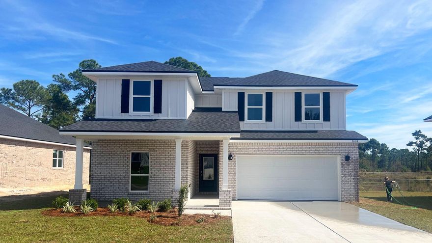 STUNNING NEW CONSTRUCTION in ROMAN OAKS COMMUNITY! NEW ''OZARK'' floorplan, a well-designed 2 story model with 2 bedrooms ''&'' a living room on ''EACH'' level. Highly desirable open concept. The kitchen, living room & dining area flow together for relaxed living. Open kitchen features: all stainless-steel appliances, pantry, Quartz kitchen countertops, nice island, smooth-top range, built in microwave & quiet dishwasher. The stairway is right off the kitchen for ease of access for both levels. Bedroom 1 offers a spacious walk-in closet, & adjoining bath has a double vanity, large shower, linen and water closet. All 3 baths offer Quartz countertops. Covered back patio, Smart Hm. system & more. Fabric hurricane window protection is included. Gulf Breeze (Midway) location.