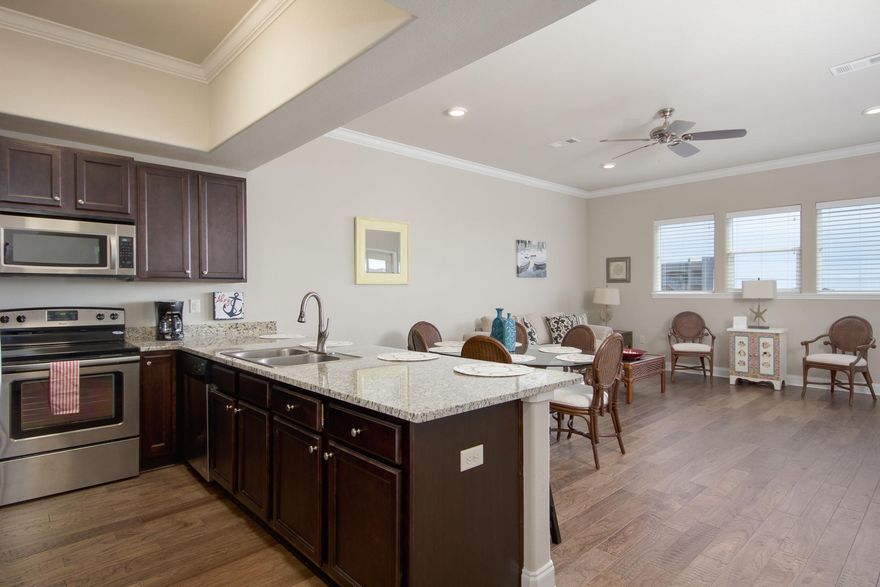 Highly coveted 4th floor Gulf view unit in pristine condition at Alerio! This impeccable unit boasts 10' ceilings, hardwood floors throughout, stainless steel appliances, and GULF VIEWS! Selling fully furnished and turn-key ready for rental or personal use. The private master suite boasts gulf views and a private en suite bath with double sink vanity, soaker tub, and a separate tiled, glass-door shower. Built in 2015, Alerio is the one of the newest condominiums in Miramar Beach/Sandestin. This fenced and gated condominium community is ideally located directly across the street from two deeded beach accesses and boasts luxury amenities including a heated pool, hot tub, splash pad for kids, and outdoor grilling area. Perfect as a rental investment or the ultimate private beach retreat.