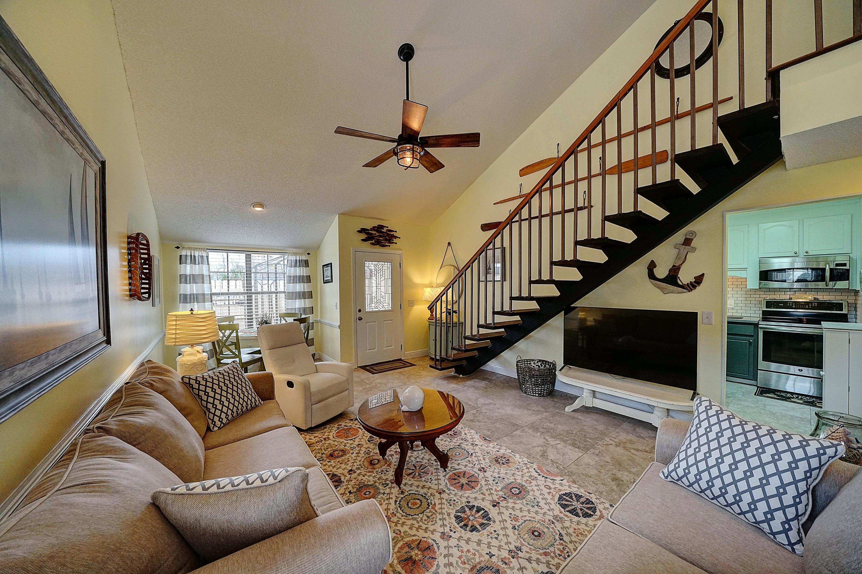Stunning condo with beautiful updates and furnishings. Own a slice of paradise in the gated resort of Horizon South! Location is everything and this one is perfect - just around the corner from the south pool and close to the beach. Corner location with enclosed patio complete with grill and outdoor seating. The interior has been freshly painted and features tile throughout 1st floor, attractive light fixtures and decor, washer/dryer, kitchen has quartz countertops, new stainless steel appliances, additional cabinetry, and more! 1st floor bedroom has a relaxing king size bed. Upstairs you will find a spacious bedroom with on-suite bath, walk-in closet and two queen size beds. For extra company, the living room has a sofa sleeper.
