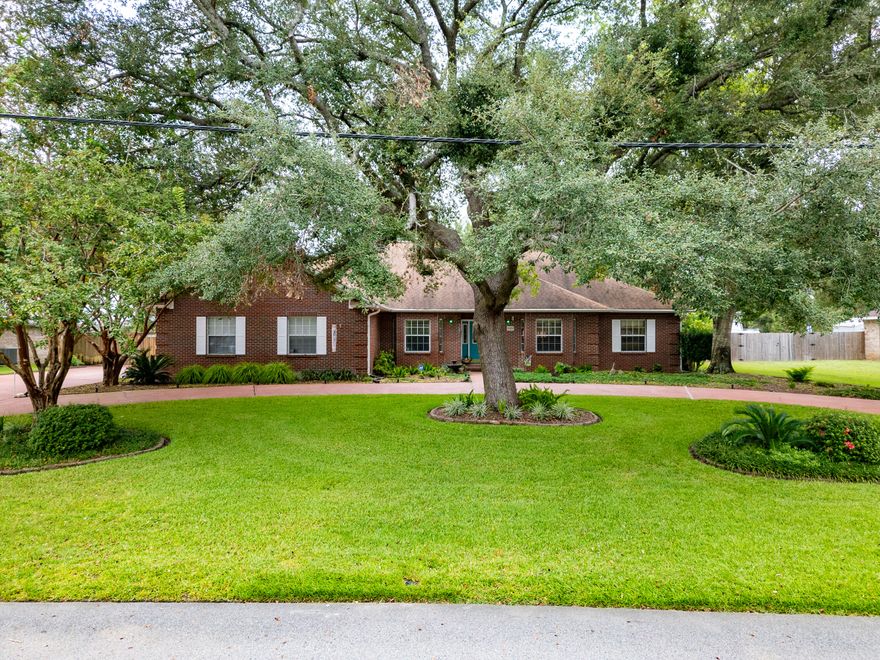 SPRAWLING BRICK ESTATE, SURROUNDED BY ENGLISH-STYLE GARDENS, NOW AVAILABLE.. and this home sits directly across from Shoal River Lakes!!!Welcome to 1009 Shoal River Drive! This 4 BR/2 1/2 Bath floorplan boasts ''grand living'' and ''thoughtful design''.From colonial brick masonry with quoin corner embellishments.. to a circular drive entry accented by lush greenery.. this 2600-PLUS square foot home offers upgrades outside and in.Step through leaded-glass doors, and you'll see upgraded moldings and trim..  neutral paint.. recessed lighting.. pocket doors.. and BEAUTIFUL HAWAIIAN KOA LVP!French doors, on the left, lead you to the formal dining room with tray ceiling and recessed crown. (Continued) French doors, on the right, lead you to the 4th bedroom, which was recently converted into an office.

The living room is grand with vaulted ceilings.. and a colonial brick fireplace! 

The GOURMET KITCHEN features custom oak cabinetry with under cabinet lighting and glass doors.. HIGH-END GRANITE.. FULGOR MILANO DOUBLE OVEN.. GAS COOKTOP.. TWO PANTRIES.. COFFEE BAR.. AND SEPARATE BREAKFAST AREA.

The master suite is impressive with tray ceiling, his/hers walk-in closets, private patio access, large windows and more of the "Hawaiian Koa" luxury vinyl plank flooring.

The master bath is grand in scale... with a deluxe-sized garden soaker tub with plant ledge, and a 2-person walk-in shower with glass enclosure. There's also 2 linen closets.. one with upper cabinet storage.. and a separate bidet!

The remaining bedrooms are spacious with generously-sized closets. The guest bath offers tiled counters.. standard tub/shower combination.. and untapped equity for the savvy buyer.

A big house needs a big laundry room and this one delivers! Check out the "Hall of Storage" leading to the KENMORE WASHER/DRYER that will convey! The owners also added a utility sink with counter and additional cabinetry.

The sunroom offers views of the english-style gardens and leads to a covered patio with BRAND NEW CONCRETE COATING.. and a 17  1/2 foot SUNSETTER RETRACTABLE AWNING!

The privacy-fenced backyard offers numerous gardens, brand new rainbird sprinkler system, gardening shed, butterfly garden, fountain, additional parking pad and lots of space (.46 ACRE). 

The open patio provides room for backyard entertaining and is wired for hot tub hookup. 

Other notable mentions: new septic drainfield, Storm Stopper Shutters, new roof in 2018 and new landcape lighting for the front yard. Check out the landscape lighting at night! #STUNNING

COUNTY TAXES AND QUICK COMMUTE TO THE BASE! What are you waiting for? Make an offer today. 