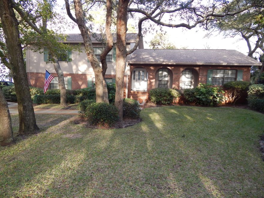 Accepting back up Offers! 100ft of Waterfront on Choctawhatchee Bay! Look out your back door and see Destin in the Distance! Ideal Location and good elevation! This Lovely, well-cared for Brick home is located on a spacious wooded lot in Elliot Point. GRAND Waterfront Views from the Master, Living, Dining and Family Room!
The Large, Bright Living Room adjoins the Eat In Kitchen, Family Room & Dining Room and opens to the Large Deck - PERFECT for entertaining! The Huge Kitchen has ample Corian Countertops, Maple Cabinets, Stainless Steel Appliances, Tiled Flooring, Tiled Backsplash, Long Breakfast Bar and SPACIOUS Breakfast room! New designer ceilings enhance the downstairs Recreation room complete with wet bar, half bath and built-in office/computer area. Upstairs, the three Bedrooms are generously sized. The Master Bedroom has crown molding, walk-in closet, double -raised sinks in the bath. and Breathtaking Waterfront Views from the Balcony!  The Guest Bedrooms are generously sized. One has a walk-in closet!  There is also a long storage room next to the garage!  Outside and Inside, the views are Spectacular - especially the Sunrise!  There is a sprinkler system/lawn pump; an outdoor shower, wood composite decking and the extra long & wide driveway has quality pavers!   The Dimensional Shingled Roof and sea wall were both new in 2005. Pilings are in place for dock and boat lift (some repairs to dock are in progress.)  Great, established neighborhood convenient to Beach, Bases and Shopping!    Sellers can close now or later - They are very flexible on a closing date.  This home is a pleasure to view!  Call to see it today!