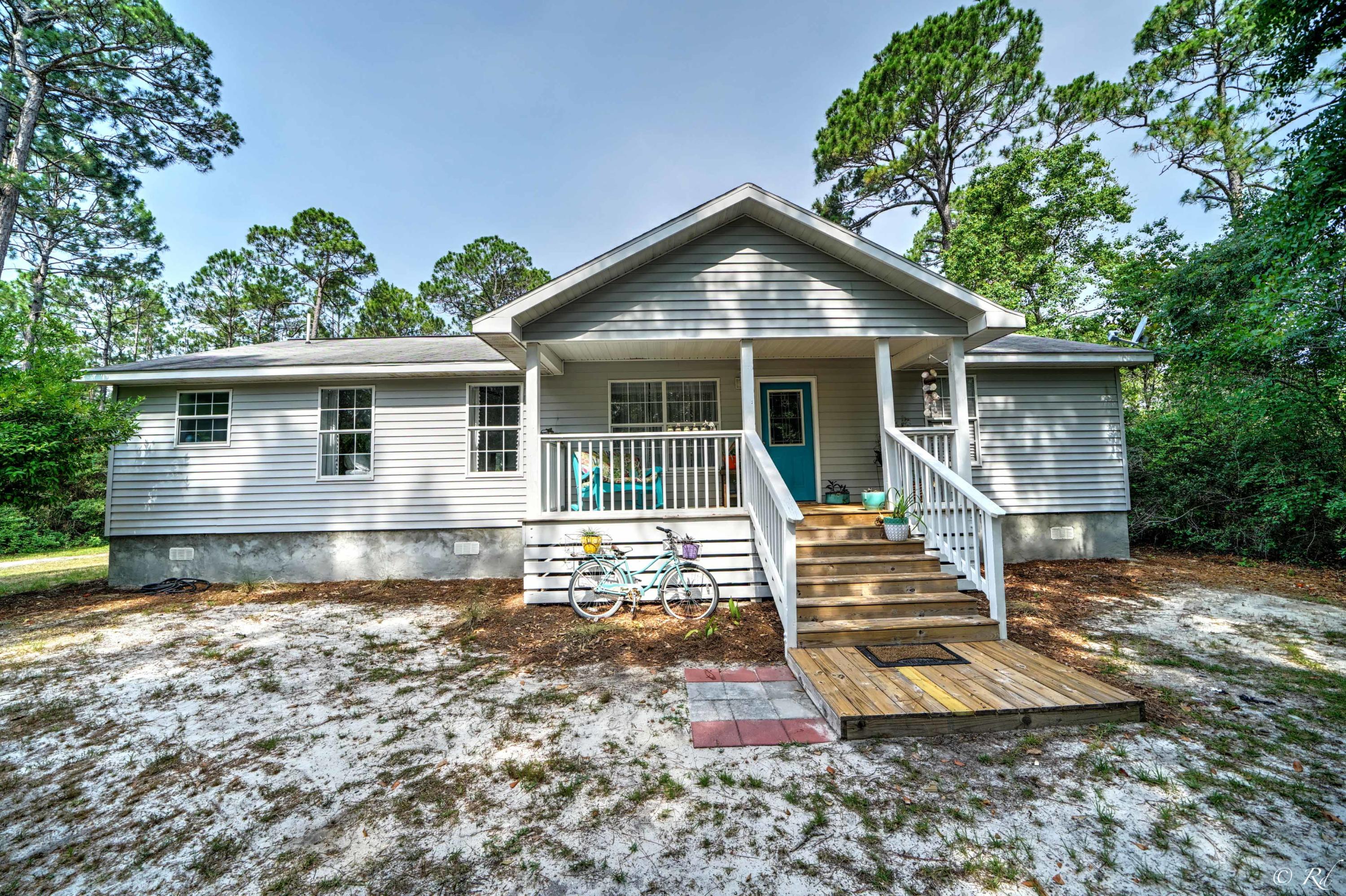 Priced to sell!! Location location location! Charming 3B/2B single family home on .62 acres, adjacent to new DR Horton Indian Cove community. Offered at $244,900, this single family 3B/2B home is beautifully maintained and has incredible rental income potential. With one of the largest lots in the area, there is plenty of room to add a carriage house, detached garage, pool or on-site boat storage. This lot and home are a rare find! Rental rates can bring in $2,000/month for primary house plus potential for additional rental income building additional structures on this extra large lot. No HOA.